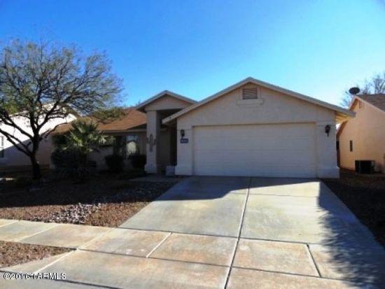 Beautiful three bedroom, two bath home located in Tucsons sought after neighborhood of Rita Ranch.  Close to local shopping, outdoor attractions, DMAFB, and I-10 as well as within walking distance to Purple Heart Park.  Split bedroom home also features a two car garage, formal living area as well as a family room off of the kitchen.