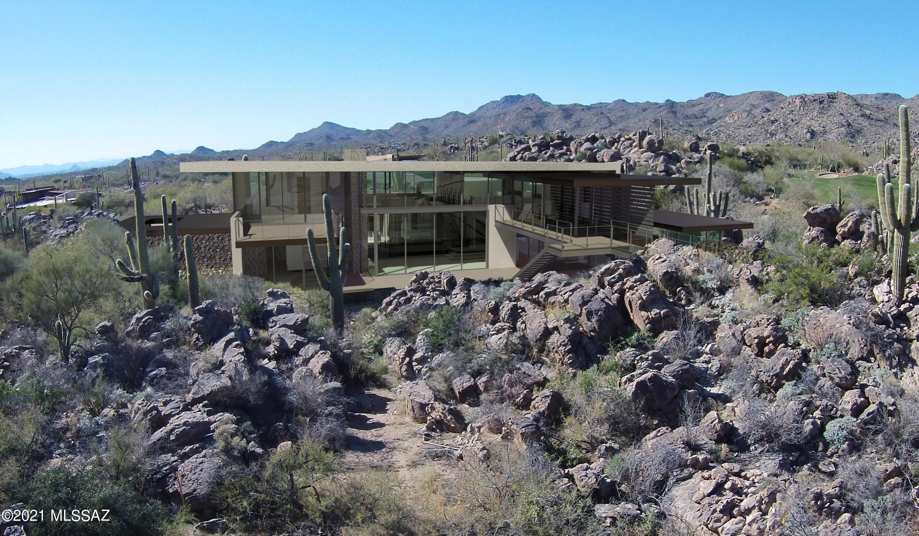 Soon to be completed!! 
Renowned architect, Kevin B Howard's signature ultra-custom 5,896 sq.ft.  residence nestled into stunning rock formations, giant saguaros within the world class guarded gates of the Stone Canyon Club. The perfect balance of luxury and nature surrounded by the deserts natural beauty with giant saguaros, stunning rock outcroppings and spectacular views!  Extremely unique, offering privacy and a fresh innovative concept of Zen living spaces. Expansive walls of windows,  a fully suspended glass bridge over 40 feet long connects the main home to the casita. Quality building materials and interior design with every possible 21st century amenity. Two master suites, guest bedroom, guest room/studio, state of the art kitchen, library, home theater, bonus room/ office /den. The swimming pool runs the distance of the back terrace with 28ft long spillway which waterfalls into lower trough. The spa is nestled into natural rock outcropping's with easy access from the master bedroom. Guest parking and private auto court are paved with interlocking pavers, 3-bay garage. Be sure to read Design Statement under documents.
This home will be sold fully appointed!