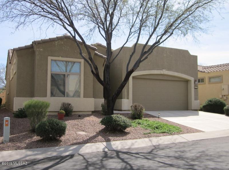 A lifestyle to embrace.  A wonderful home with southwest-style living--a great room, a dining area, and a kitchen that any Chef will love to work in, while entertaining your guests and family at the same time!  Great appliances, with a large island work area, a large pantry closet, plus a breakfast bar, too! Two large, separate bedroom suites with fabulous baths and ample walk-in closets, with plenty of space.  Beautiful SW tile flows throughout; living area and master BR have beautiful laminate, and guest BR has cozy carpet!  New HVAC unit in 2018, along with reverse osmosis, and water softener. Come embrace this no-worries lifestyle!   HOA provides the following amenities: landscaping, stucco, paint, and roof. Water for landscaping, monthly pest control, exp. basic cable TV, weekly trash and recycle pickup, fire, hazard, and liability insurance, common areas, gates, and road maintenance.