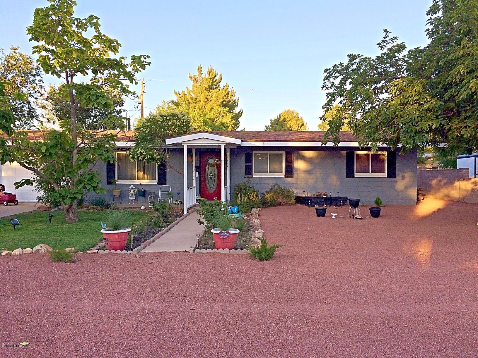 Updated 4 bedroom, 2 bathroom home with 2 car garage in town. Newly remodeled kitchen with island and granite countertops. Completely remodeled bathrooms with new plumbing. Addition with bonus room and den. Backyard is landscaped and has a firepit, block wall provides great privacy.