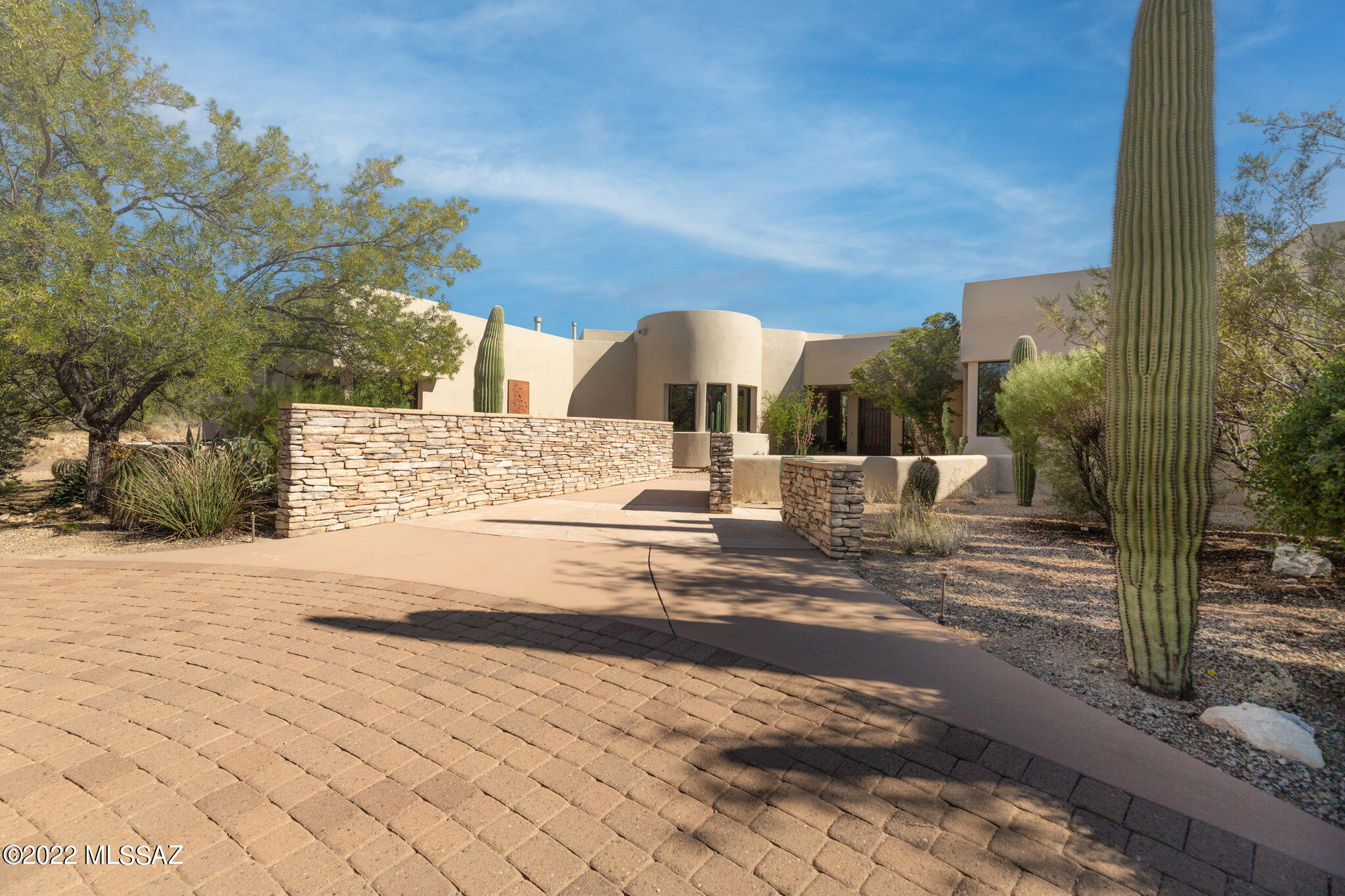 This gated exquisite luxury home, offered for $1.4M, on 3.72 private acres, has 3 Br 4 Bath & office with spectacular views of the nearby Rincon Mountains (4th Bedroom?). Built in 2006!! A private perimeter lot in prestigious La Cebadilla. A spacious 3 car garage, don't miss the 3rd bay with a window viewing multiple saguaros & the  glass pane garage door! The owner's suite & fireplace, & office, present a resort ambience with mountain views & private patios. Ultra-fine craftsmanship abounds. Kitchen: Top-grade granite counters, double ovens, alder cabinetry, wine fridge & more. The east-facing backyard & spacious covered patio has heated pool, spa &  fireplace. The attached guest casita has 2 Bd, 2 Baths and a private entrance. Click on Photos, Tours, & DON'T MISS THE SUPER VIDEO! Nice!!