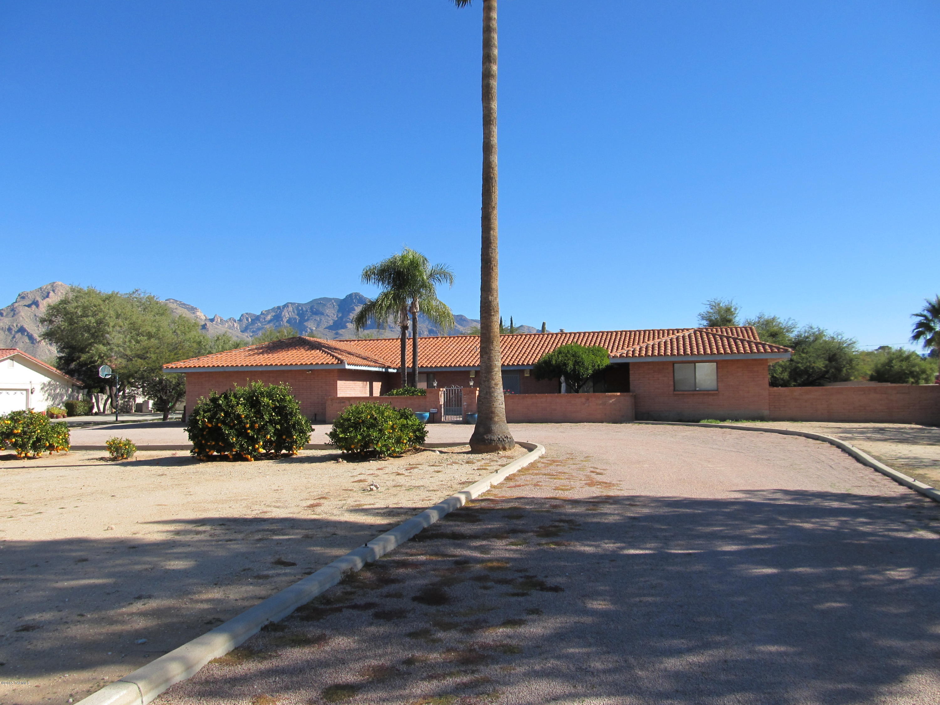 This Home Is A Rare 3 Bdr 2.5 Bath That Sits On Over An Acre Of Land In A Great Neighborhood Close To All City Amenities. You Will Find A Large Entry Way Flanked By Large Formal Living And Dining Room As Well As A Family Room With Fireplace. The Kitchen Boasts An Island, Tons Of Counter And Cupboard Space And A Large Eat In Area Situated In A Bay Window. The Laundry Room Is Enormous And As Big As Another Room With More Cupboards And Counters Along With A Huge Storage Pantry. Every Room In The Home Is Very Spacious With Many Windows Looking Out To The Beautiful Yard. The Yard Has Many Features Including Many Sectioned Off Areas, Open Areas And Its Own Mini Orchard. I Cannot Say Enough About This Home Except You Must Come And See It. Call Now Before It Is Too Late.