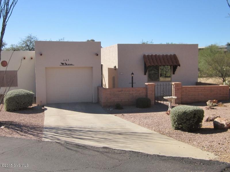 Such a refreshing change to the typical Granada floor plan. The look, the feel, and the space is very well done with tons of counter space, as well as cabinets galore. The kitchen has transformed into a 21st century kitchen with a great overhead light and look! The kitchen and laundry room flow into one--a well thought out plan to be sure! The AZ room is extremely well done; lots of space, tiled, and the room could be used for a den, study, office, and hobby room; very functional and light and bright. There is a mountain view from both the AZ room and the back patio, which backs to a wildlife-bird sanctuary, with lots of privacy and quiet! This is a unique home; you need to see it and then you will want to make it your own! Perfectly situated; close to shopping and heart of GV!