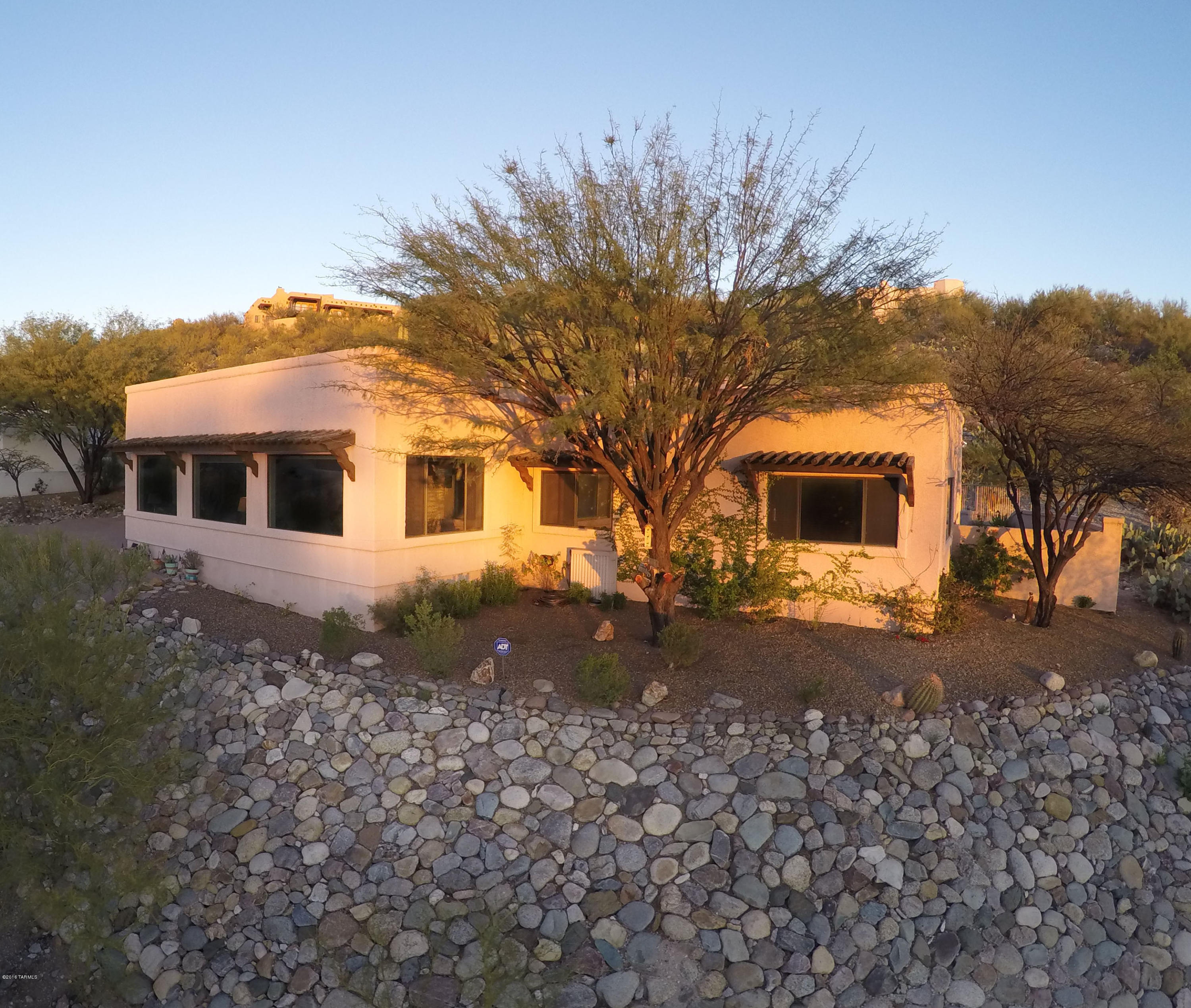 Sellers will consider offers between $350,000-$375,000. Secluded hilltop,3 Bdrm/2.5 Ba/split floorplan.Meticulously cared for home with magnificent mountain,sunset,and city views.Truly,a perfect home for entertaining with lg.F.R. and wet bar.Double doors lead from F.R. to beautiful backyard with covered patio and sparkling pool. Outside F.P. for those chilly nights!Open,but formal and separate L.R. and D.R. with lg. windows,allowing for tons of light and beautiful views from front of home.Extra wide hallways.Charming and very homey kitchen with lg. pantry and tons of cabinets.Spacious master B.R. with gas F.P. and walk-in closet.Master Ba. has whirlpool tub,separate shower,and double sinks.Other features are oversized 2-car garage,gas stub for BBQ,outside storage shed,and lg.laundry room.