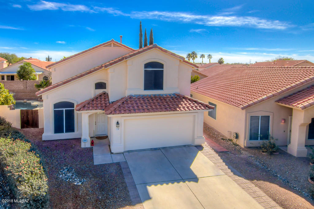 Are you looking for that 'WOW' FACTOR? Then look no further because this is THAT house. 4 bed -2 ½ baths FULLY UPDATED to include: TRAVERTINE flooring THROUGHOUT (NO carpet) & was polished & sealed 2016, kitchen w/5 burner GAS STOVE, SS appliances, GRANITE countertops, updated cabinets & hardware, DUAL PANE windows, ceiling fans in all rooms, added 155 sq ft bonus AZ room w/heating & cooling, wrap around brick paved patio, PEBBLE TECH pool w/water feature. NO popcorn. Master bed has MOUNTAIN views, huge walk in closet, MBath includes garden tub, exec height GRANITE counters & walk-in-shower w/travertine surround. 200 sq ft balcony off Guest Bed 2 has amazing sunrise/sunset views. Cathedral ceilings, eat in kitchen w/bay window, large private lot, new H20 heater in 2016, alarm installed