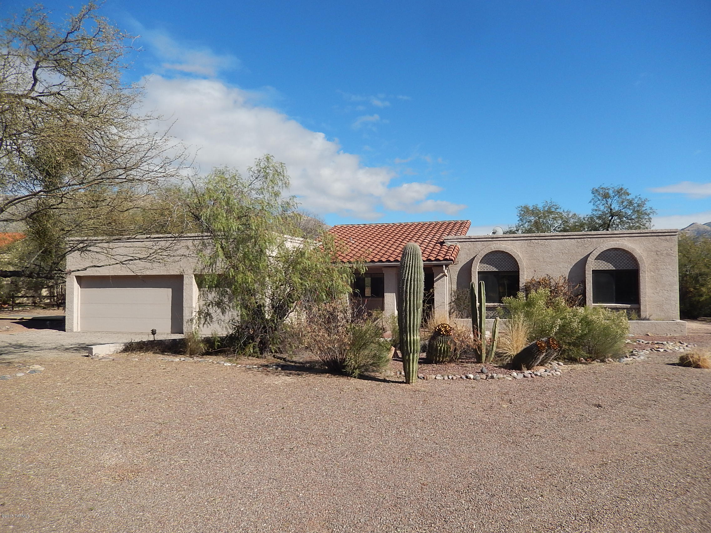 Another Great HomePath Property - Move-in ready with new decorator paint and carpet.  Don't fight crowds, switch to this spacious 3 bedroom, 3 bath, large family room with fireplace, formal dining, sunken living room, office, utility room and a 3 car garage.  Every day will be a vacation with a pool and patio as pretty as this with the Catalina Mountains as your background.  Buy tomorrow's security for your family today.  Special HomePath First Time Home Buyer Program with 3% closing costs available to qualified buyers (see attached flyer for details).