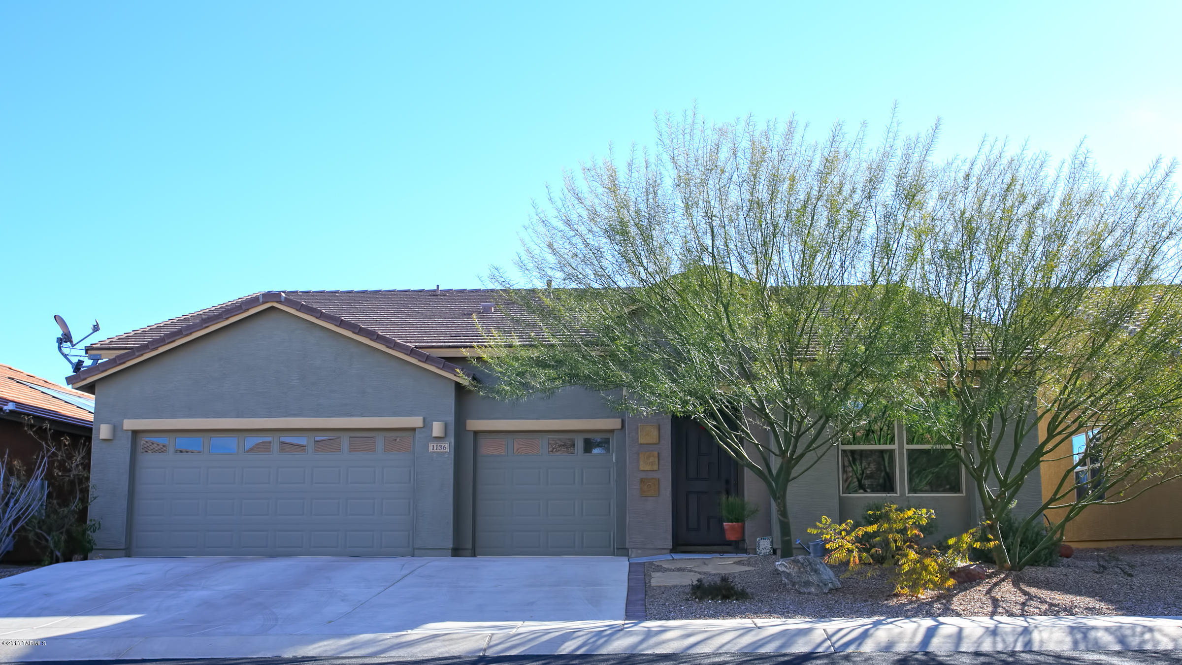 MOUNTAIN VIEWS and NO REAR NEIGHBORS in this like new MATICULOUSLY maintained home!!! Lot backs to common area. Many UPGRADES including water softener, reverse osmosis water filtration system, epoxy painted garage floors, ceramic tile through most of home except bedrooms and den area, granite kitchen counters, espresso colored cabinets, glass pendant lighting over kitchen island area, stainless steel appliances, blinds and ceiling fans throughout, outdoor brick paver patio extension, grass turf area, kids play set, and outdoor fire pit. Floor plan boasts 4 bedrooms, 2.5 baths, GINORMOUS kitchen/great room area, separate den and formal dining area, and 3 car garage!!! Don't miss this one!!! GORGEOUS!!!