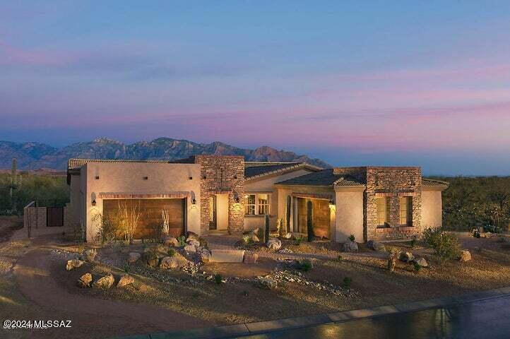 This beautiful former model home is in the highly sought after Tortilita Vistas gated community with an East facing backyard with gorgeous mountain views. Features include a gourmet kitchen, SS appliances, double ovens, gas cook top, SS hood, walk-in pantry, upgraded granite countertops & custom backsplash in kitchen, coffered ceilings at foyer, dining room & primary bedroom. Open concept great room with built-in shelving & cabinets has a 12-foot multi slide glass door that integrates indoor/outdoor living. The expanded primary suite has upgraded tile surrounded dual vanities, custom shower, huge soaking tub and huge walk-in closet off laundry room. The 3 additional Bedrooms, with Jack-n-Jill & connecting bathroom, all with upgraded tile, upgraded granite vanities, bathtub/shower & walk in closets. Den/Game/TV room has built in cabinets & wooden shutters. Other rooms include an Office & Laundry Room with lots of built-in cabinets and sink. Other home features include 75-Gal Water Heater, upgraded flooring, upgraded lighting, solar tube, owner owned solar panels on roof, speakers in every room and 2- Two Car garages with A/C. Outside has custom pool with waterfalls, separate hot tub, gazebo with lighting, fireplace, and built-in BBQ grill area. Home was freshly painted April 2024 outside. Wine fridge and all TVs stay. New solar inverter box April 2024.