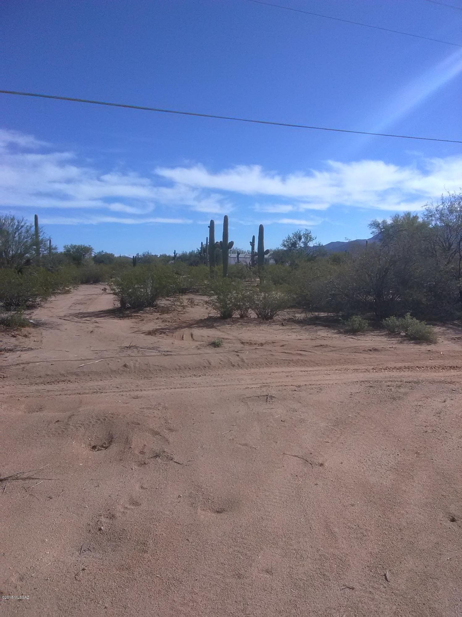 NICE 1.98 ACRE PARCEL WITH 214 FEET ON SANDARIO RD. HAS SEPTIC SYSTEM AND WATER METER.