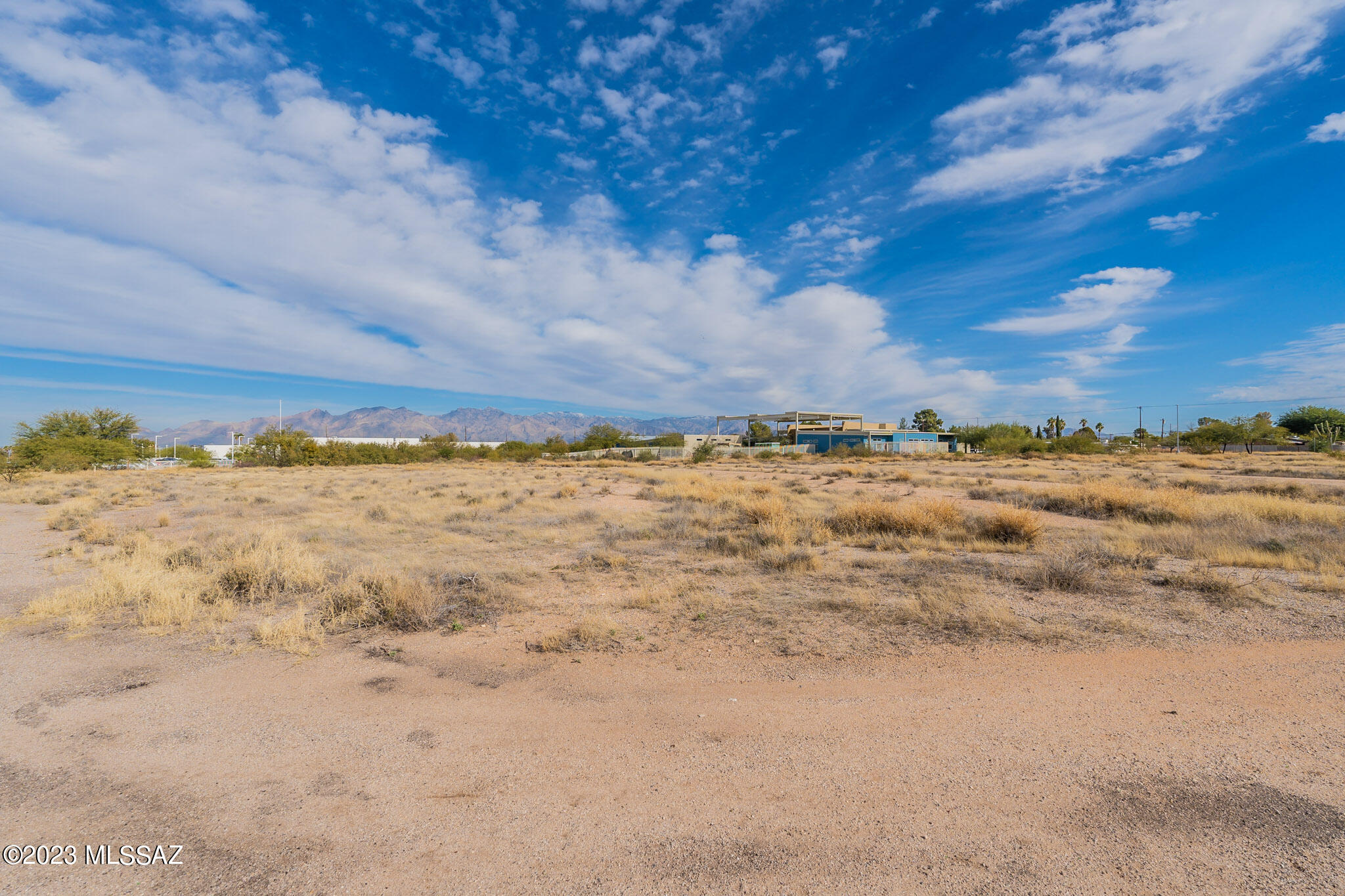 Prime large land parcel and improved building available for sale. Welcome to 1300 S. Belvedere Ave conveniently located in the heart of central Tucson.  Located 15 minutes from Tucson International Airport, 13 minutes from the University of Arizona, and just 11 minutes from downtown. 

The subject parcel consists of an improved state of the art 21,272 square foot building, currently being used as a school. The building is divided into 4 sections., Building 1 - 6,564 sq.ft., Building 2 - 5,141 sq.ft., Building 3 - 6,126 sq.ft., Building 4 - 3,441 sq.ft.