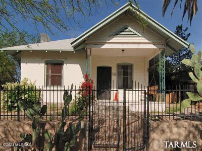 Do not miss this classic craftsman bungalow in the West University Historic District. Lovely wood floors and original woodwork throughout. Kitchen was updated, but still retains its charm. Tons of storage, walk in closets, built-ins and a storage room.  Electrical was updated in 2005. Private yard with covered patio and latticed ramada offers restful escape. Easy walking distance to 4th Ave