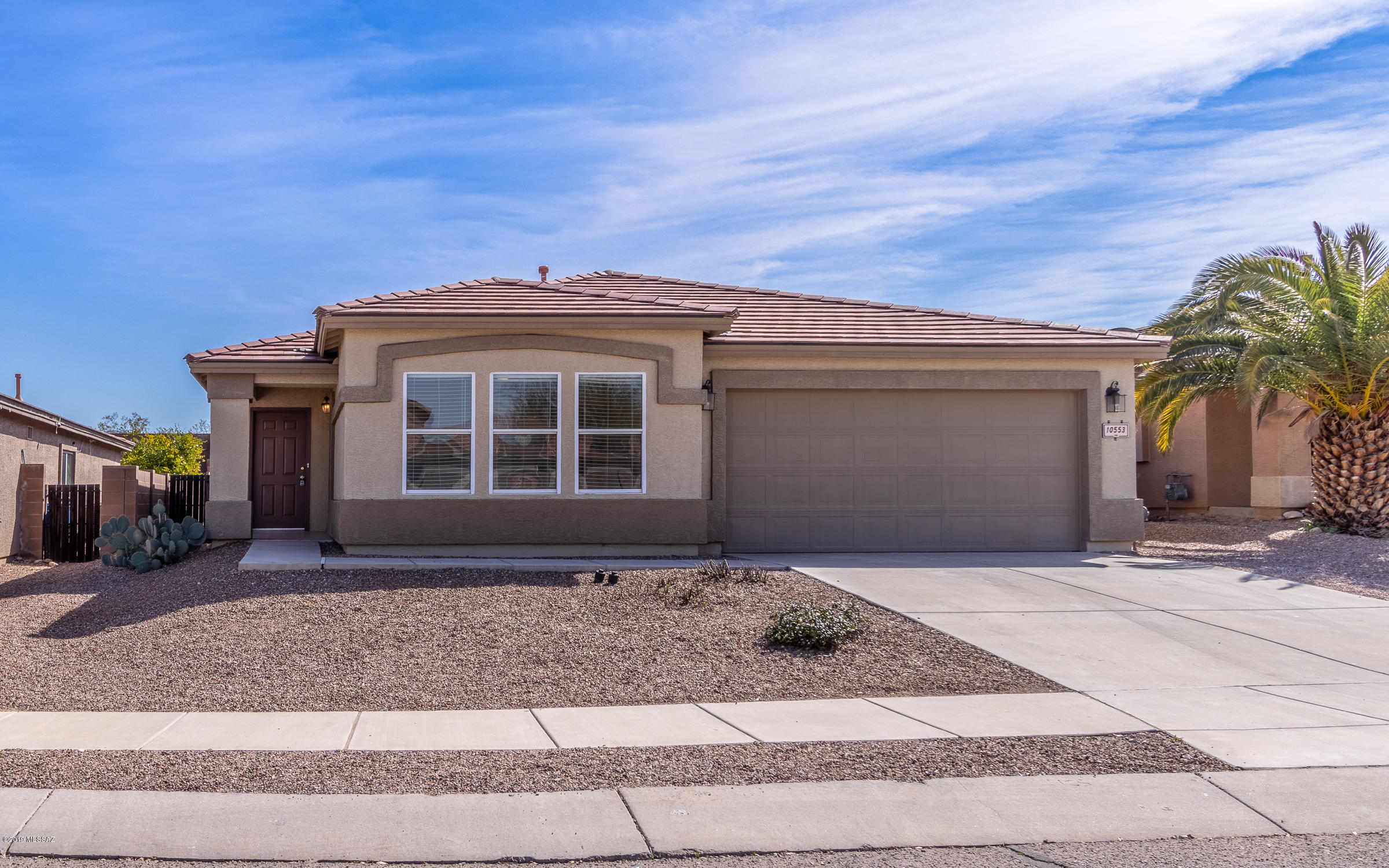 Tired of looking at houses? This newly updated contemporary will seem like home the minute you walk through the door. Featuring a spacious Great Room, dining area & kitchen w/ lots of 18'' ceramic tile. Be the first to enjoy the brand new Giallo Ornamental granite counters, sinks & faucets in the kitchen and all baths. The carpet is new. The interior paint is new. You have a sparkling salt water pool. Not only are there 3BR & 2BA, you also have a den/office. Best of all, there's a common area behind the wall, so your pool area will remain private. Why buy new when you can get everything you've searched for at a great price! Did I mention that it's located in the acclaimed Vail School District?