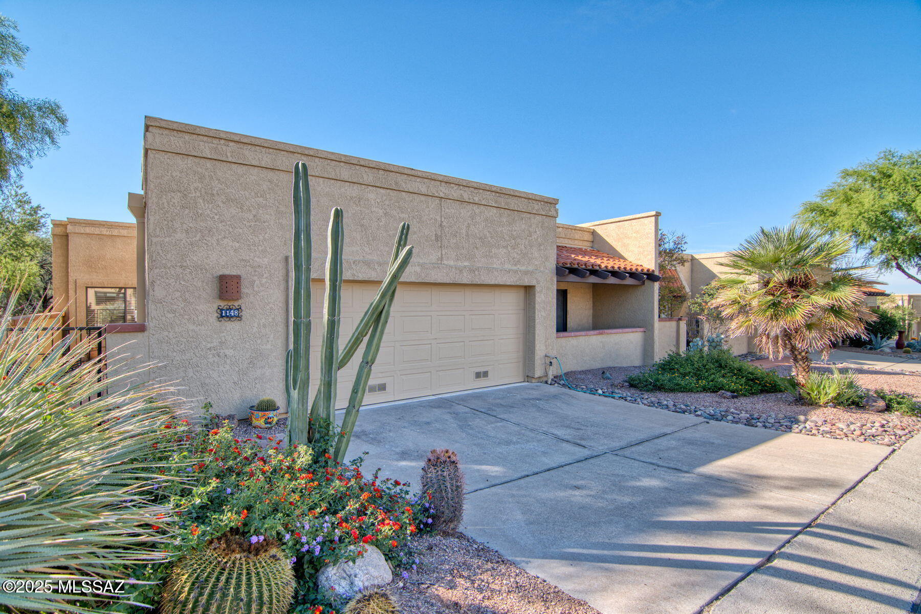 Step into elevated living with this beautifully situated patio home nestled within one of Oro Valley's most coveted communities. Located adjacent to the famed Hilton El Conquistador Resort grounds and the scenic Pusch Ridge Golf Course, this tranquil end-unit offers a perfect blend of comfort, panoramic views, and low-maintenance luxury. 

Freshly renovated from top to bottom, the home features brand-new flooring, stylish cabinetry, and brand-new furniture throughout—delivering turnkey elegance from the moment you arrive. Retreat to the private patio-home setting where you'll enjoy story-book mountain and fairway views, a serene environment, and the best of resort-adjacent living.
Please call listing agent for seasonal rates and availability. All utilities included & pet friendly Freshly renovated from top to bottom, the home features brand-new flooring, stylish cabinetry, and brand-new furniture throughoutdelivering turnkey elegance from the moment you arrive. Retreat to the private patio-home setting where you'll enjoy story-book mountain and fairway views, a serene environment, and the best of resort-adjacent living.

Interior highlights include a single-story layout for ease and accessibility, a bright and open floor plan, refined finishes throughout, and a fully furnished space ready for your lifestyle. Outside, the home boasts its own private pool/spaideal for relaxing after a round of golf or enjoying Arizona's beautiful evenings.

Whether you're seeking a full-time residence, second home, or vacation escape, this property blends sophistication with leisure. With resort amenities just steps away and the Catalina Mountains as your backdrop, this home delivers a rare combination of location, luxury, and lifestyle.
