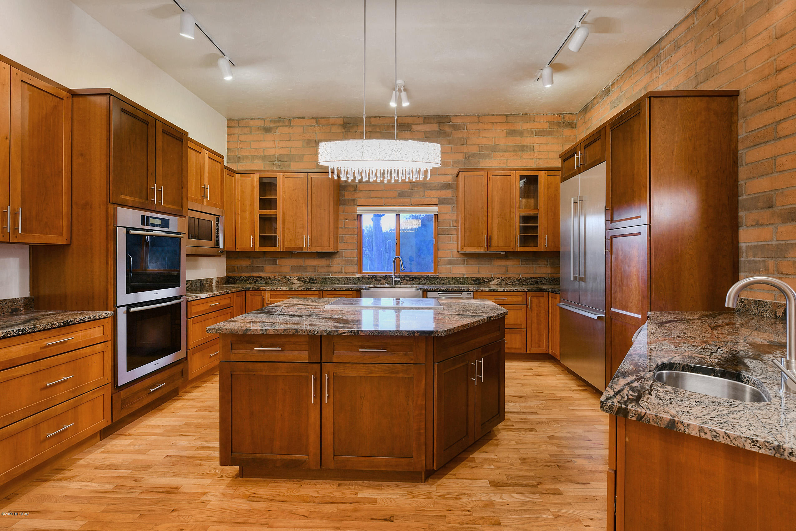 Beautiful Burnt Adobe Brick 4,375 sq ft. Minutes away from Skyline/Campbell. DIST 16. New TRANE heating and cooling, New Milgard wood cased windows, All bathrooms and Kitchen complete renovation. Lovely 5 series granite in kitchen, with all high end appliances, Beautiful solid wood custom cabinetry. New modern LED lighting, ceiling fans and light fixtures. All bathrooms have granite countertops and custom walk in showers. One tub/shower combo in 2nd master suite or guest quarters. All feature designer tile accents. Two lovely wood burning fireplaces, master and downstairs f/r Don't miss the great backyard space with built in outdoor BBQ, gated courtyard, and sparkling pool. Spectacular outdoor living space. Private basketball court to the west of the property.  
A new home for the Holiday