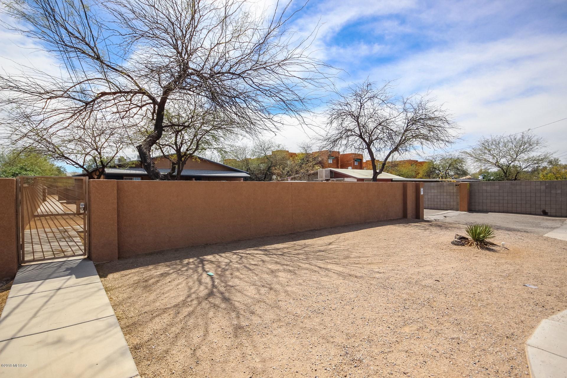 Great opportunity to own a piece of ''The Old Pueblo''!! Updated four-plex with wonderful mountain views! Each unit has a full kitchen, bedrooms, and living area. Community laundry facilities. Well maintained landscaping and a quaint picnic area on property! Don't miss this rare chance!
