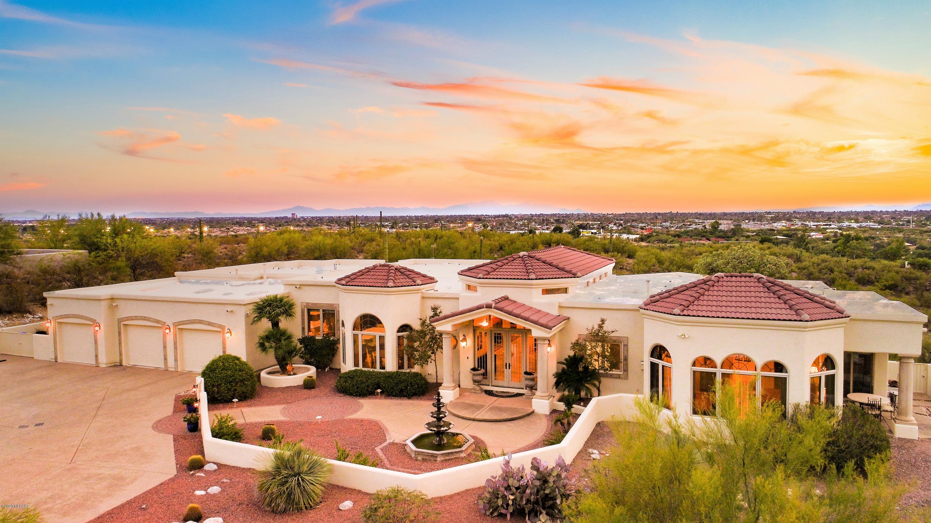 Incredible Estate-Like Property on a Premium Foothills Ridgetop. Very Special Location offers Panoramic Mountain & City Views. Gated Bellas Catalinas Estates is Perfectly Located Close to Town yet Surrounded by Gorgeous Sonoran Desert Foothills. Spacious Split Floorplan Offers 5 Bedrooms, 5 Bathrooms, Exercise Room & Large, Executive Size Home Office! Gorgeous Newly Re-Modeled Chef's Kitchen Features Large Marble Island, Handcrafted Cabinets & Walk-in Pantry. Built-In GE Monogram Refrigeration & 42'' Gas Range & Double Oven. Other Recent Improvements Include Travertine Flooring, Re-Designed Family Room W/ Pella Windows/Doors and 3 new HVAC Units. Enjoy the Expansive Rear Yard W/Patio, Built-in BBQ, Inviting Pool/Spa & Amazing Sunset Views. Large 3-Car Garage & Versatile Oversized Sideyard.