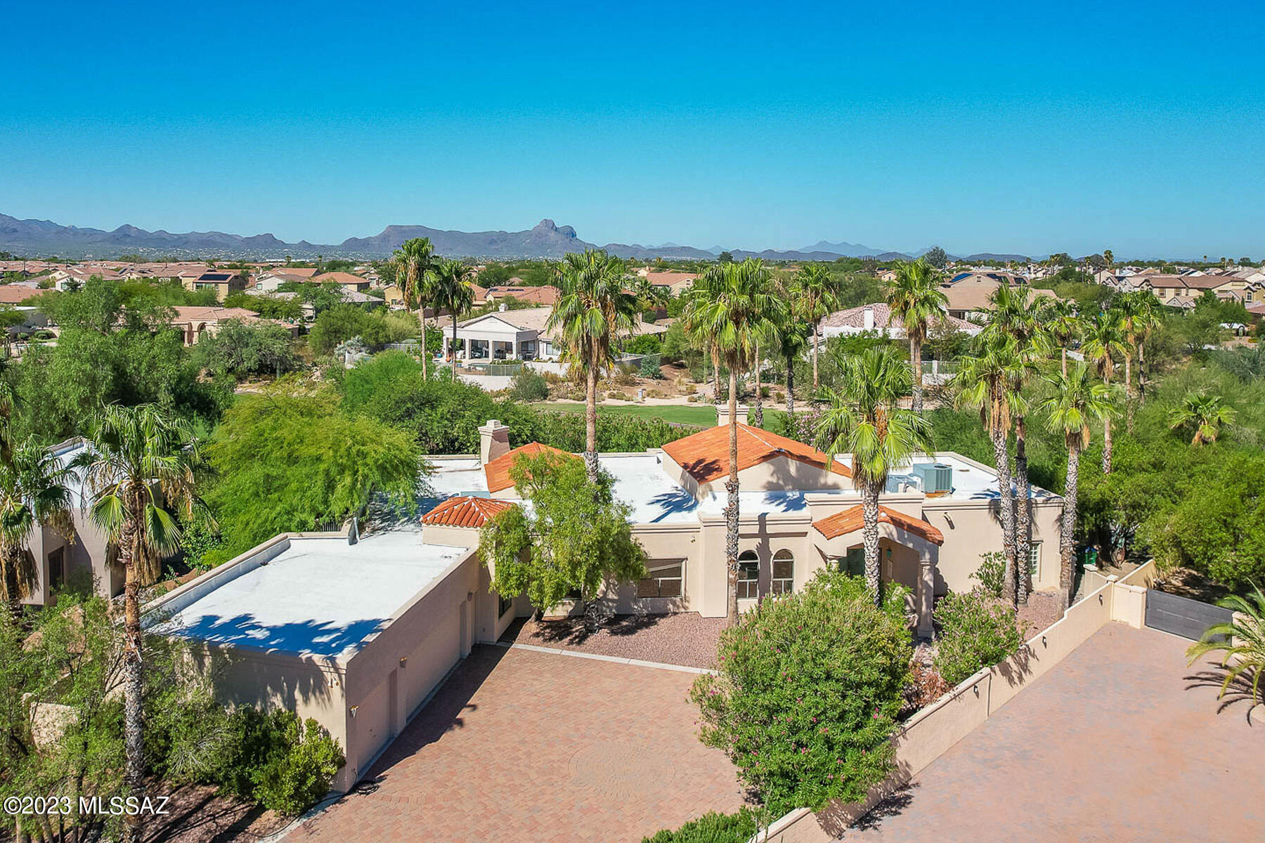 Spacious 4BD/3.5BA + den (3,800sf) estate with private pool/spa located in Nob Hill Estates within Omni Tucson National Resort. Situated on quiet cul-de-sac, this home backs to the golf course but still has that secluded feeling. Enter to find cathedral ceilings, formal & informal living spaces and screened in covered patios. Kitchen hosts breakfast nook, serving buffet, walk-in pantry. Primary bedroom w/ ensuite bath includes 2 spacious walk-in closets, architectural coffered ceiling, and private access to the back patio. Relax in the secluded back yard where mature palm and mesquite trees and flowering shrubs surround the pool/spa and create a tranquil resort like oasis, still with peeks of the golf course. Enjoy nearby golf and restaurants within Community. This is a must see!