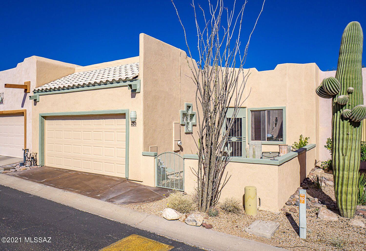 The front courtyard warmly greets you to this largest floor plan in Canyon View.  This home has been lovingly cared for with some new appliances in 2015, pull-outs in the kitchen, newer water heater in 2017.  The kitchen range is also plumbed for gas and you'll appreciate the butcher block kitchen island.  This home offers a den and an Arizona Room, as well as a back patio.  You'll also love this very friendly community - where you'll enjoy their own pool and spa, exercise room and many activities are also offered.  Soft water loop available in garage.   GVR is not on this property, but it is available.  Sellers request Close of Escrow no earlier than 1/1/2022.