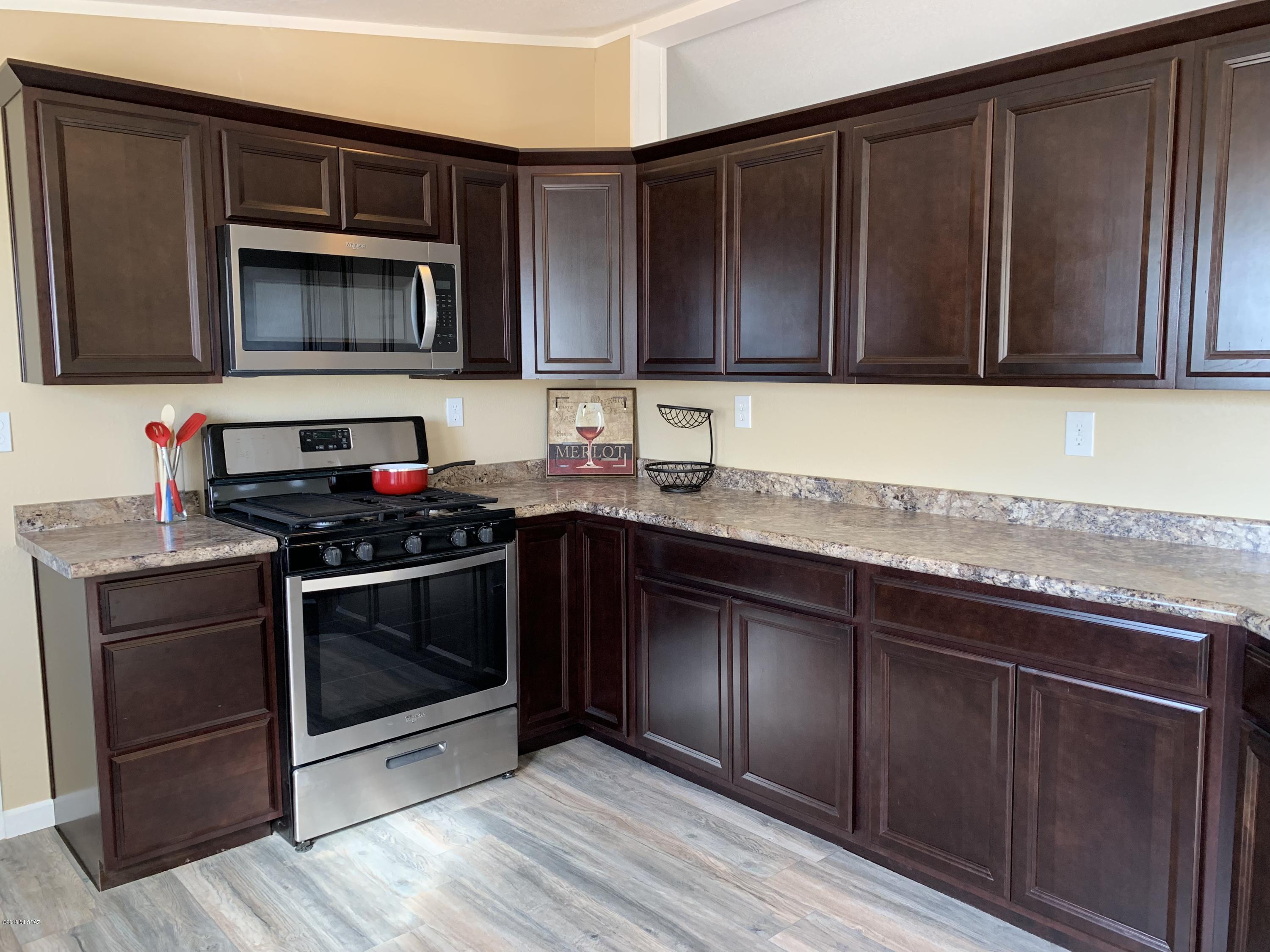 Spectacular remodel!!!! Just unpack and relax in your newly remodeled home on an acre. Fully fenced back yard, new roof all new flooring, new stainless steel appliances and interior and exterior painting (that is just a few of the items). YOU REALLY NEED TO GO SEE THIS HOME to see all the custom touches.