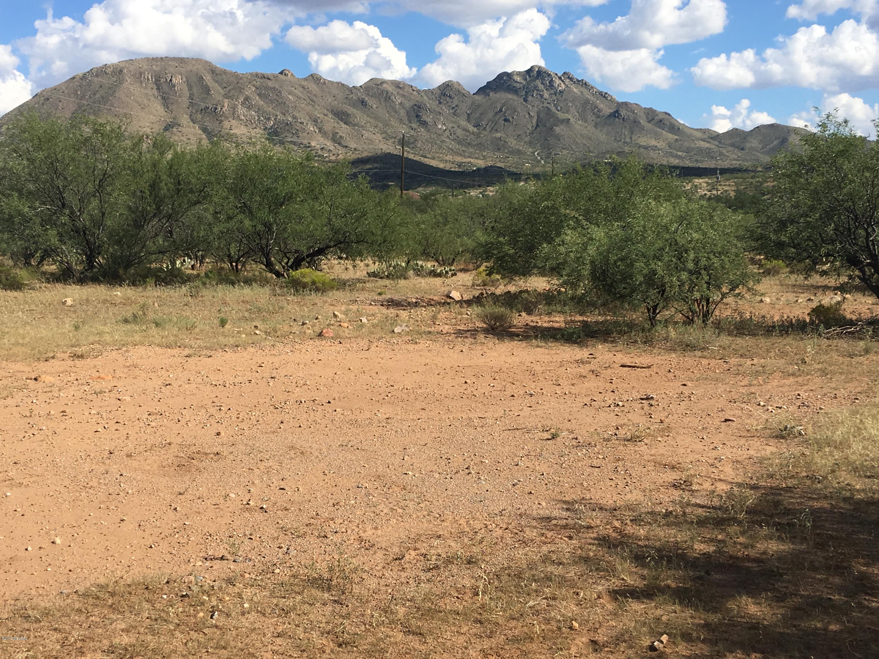 Very nice level building site in San Cayetano Vistas on paved cul-de-sac with water and sewer nearby. Excellent views of San Cayetano Peak and the Santa Rita mountains.
