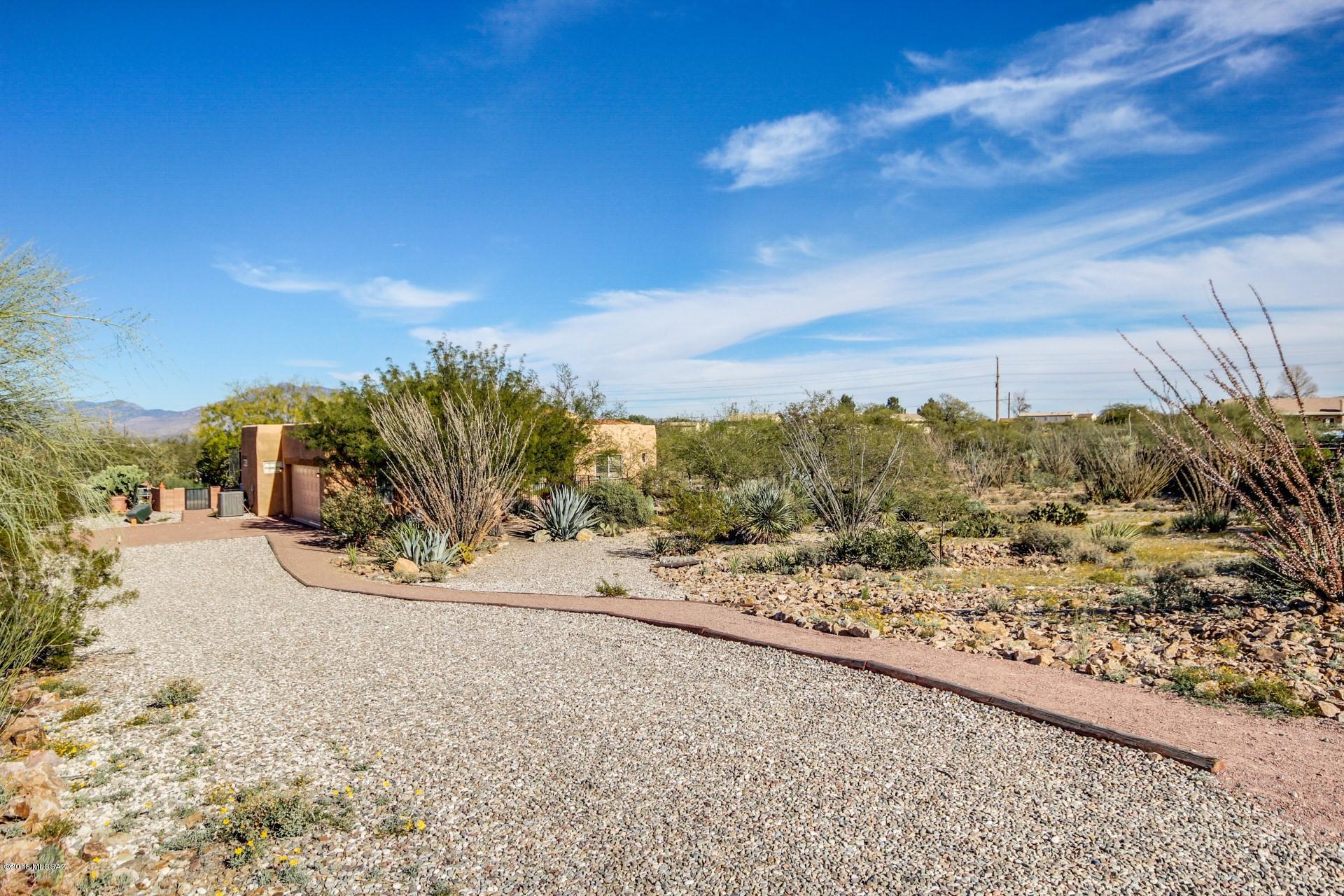 Enjoy endless privacy and beautiful mature landscaping throughout! Desert living at its finest! Located on a quiet cul-de-sac lot, the land is a full acre with sweeping mountain views and plenty of room for all of your toys. Easy access to the 83 and I-10 freeways. This home boasts over 1500 square feet 3 generously sized bedrooms, and large living room. The eat-in kitchen includes a charming breakfast nook, light wood cabinetry. Add this one to your must see list today!