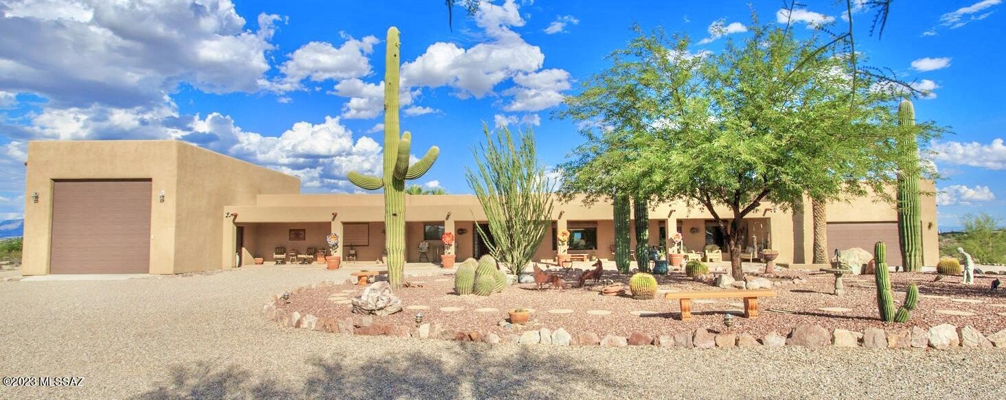 Mountain, sunrise, sunset & city views, boasting a lifestyle that meets both entertainment and retreat! Raised on 4.6 acres with almost every amenity: 3,067 SQFT primary home + 343 SQFT Guest House. 4 bed 4 bath, flagstone entry, indoor billiards and bar room, solar heated pool, hot tub, koi pond, temperature controlled wine shed, detached activity room, many outdoor sitting & entertainment areas, 3 car extended garage, attached RV garage with workshop & lift. Exterior rolling security shutters & owned solar system and private well. So many amenities that you must experience this home in person to see ALL that it has to offer!
