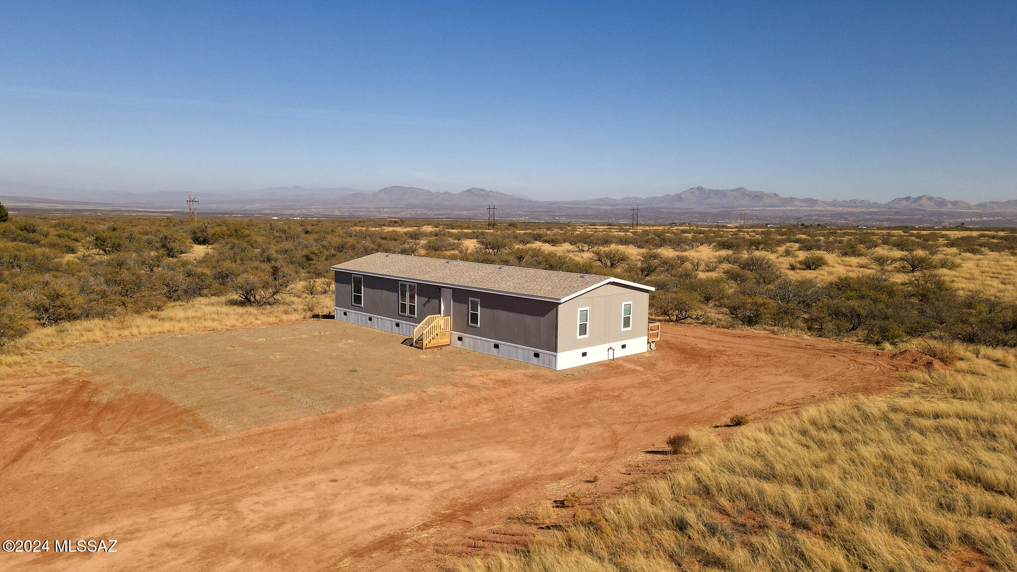 Discover the perfect blend of comfort and modern design in this BRAND NEW 2016sqft manufactured home!  Nestled on a sprawling 4-acre lot, this move in ready residence offers 4 spacious bedrooms and 2 beautifully designed bathrooms, providing ample space for family and guests.  Inside you will find 9ft ceilings and 8ft doors that create an open, airy atmosphere.  The kitchen features brand new stainless steel appliances, sleek granite countertops, and plenty of space to entertain.  The home is ready for your personal touch, with endless potential for landscaping to create your ideal outdoor oasis.  Whether you envision lush gardens, outdoor entertaining areas, or simply open space to enjoy the tranquility of country living, this property has it all!  Don't miss out!  Call today!
