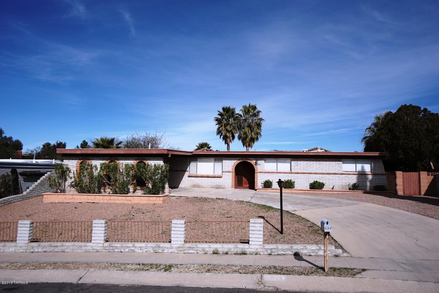 Nice spacious open 3 bdrm/2bath home. Open Kitchen with Island. Family room off kitchen. Dining room, Living room, Tile flooring with carpet bedrooms. A/C, extra storage, Laundry room with W/D hook up. Large covered patio with low care landscape. TUSD Schools, close to DMAFB and shopping (Golf Links/Harrison)