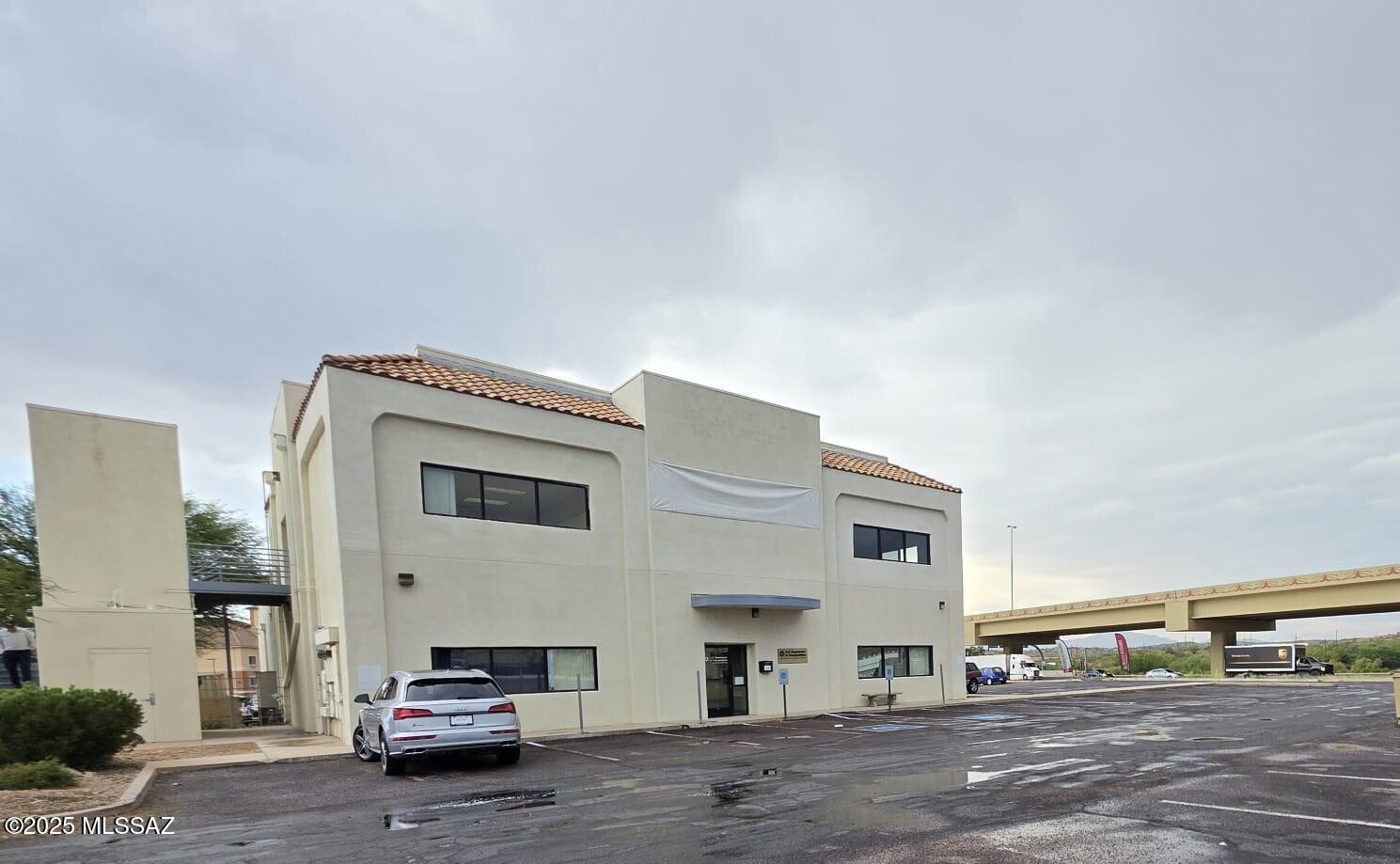 BUSINESS INVESTMENT OPPORTUNITY!! This 7466 sq. ft. very well built & maintained two story building  located on Mariposa Rd which is one of the best business areas of Nogales and currently having substantial growth.  Less than 1/4 mile from 1-19 Freeway, less than 3 miles from the Mexican border. A lot of traffic visibility exposure. Private parking and private elevator. This property is zoned for many different types of businesses., e.g.  office, business services, retail, school, medical and much more.