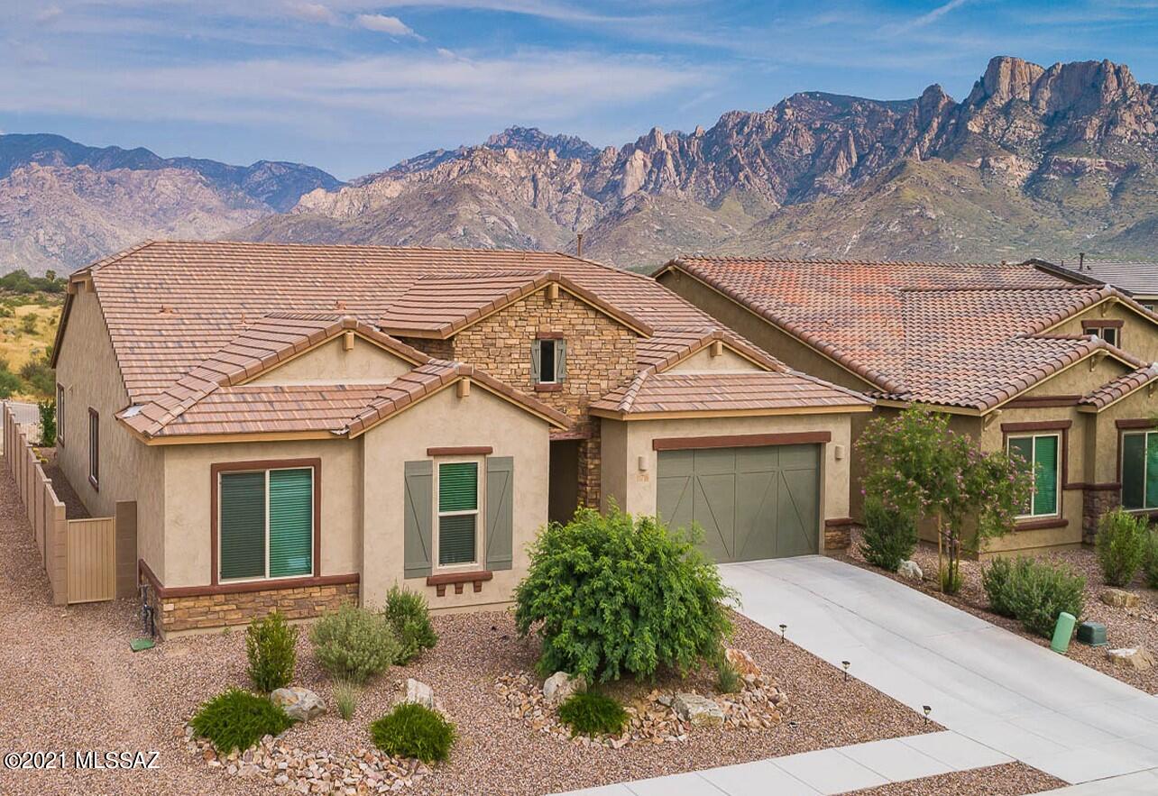 Incredible Opportunity! Premier View Lot at Oro Valley's gorgeous Silverhawke by Meritage. Owner paid substantial Lot Premium for this rare Corner Lot w/ Panoramic views. Protected Open Space to the East protects the quintessential Sonoran scene...gorgeous natural Desert, the rugged Catalina Mountain Granite Outcroppings and Spectacular, colorful Sunsets. Open & Bright, Meritage's Popular Presidio Floorplan is a Gem! Split Floorplan w/ 4 Bedrooms plus Den. Amazing spaces...huge kitchen pantry, 3-Car Tandem Garage, Mud Room, Large Laundry Room, etc. Lightly lived in & absolutely Turn-Key. Gorgeous backyard w/ Paver Patio and Turf areas. Gorgeous Open Kitchen w/ Large Granite Island, Upgraded Cabinetry & sleek Stainless Steel Appliances. Stellar Master Bath w/  ''Super Shower''.