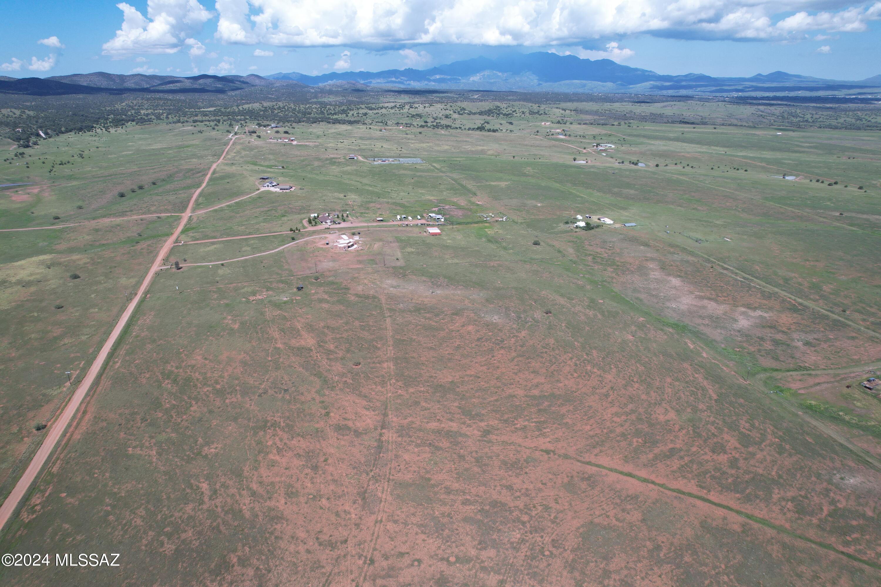 Located 1 hour southeast of Tucson, Arizona, this property sits in the highly coveted American Viticultural Area where local wineries and distilleries are thriving. The Sonoita AVA is the first federally recognized wine growing region in the state of Arizona. Families enjoy the country surroundings while only being 45 minutes from the award winning Vail Unified School District.
Open rolling grassland lot is completely fenced with a private well accompanied by 2 storage tanks and a solar pump. Electricity is close by, however septic and propane would need to be installed by new buyer. Zoned GR & can be split up to 5 times with a land split application. Min lot size is 4.13 acres (180,000 sq ft) with min width requirements