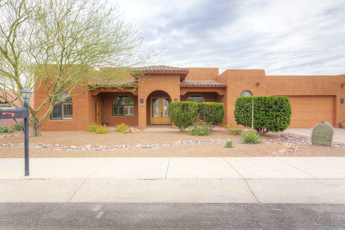 This highly upgraded custom built beauty is designed with excellent taste,style and quality.Soaring ceilings,tile floors&baseboards,Whitney Burns shutters,alder doors,recently remodeled chef's kitchen features granite slab counters, custom alder cabinets, stainless appliances,double ovens,wine refrigerator, center island w/raised bar for seating.Family room w/beautiful tiled gas fireplace.Master suite w/French doors to back patio,California Closets,an exquisite tile glass block shower(check out the pics!)and a spa tub.One bedroom has a separate entrance option that is ideal for guests or home business.Backyard oasis perfect for entertaining&relaxing & features a sparkling heated pebble-tec POOL, spa, covered patio, grassy yard & mountain views. 2 -1/2 garage w/6x10 extension &  storage galore!