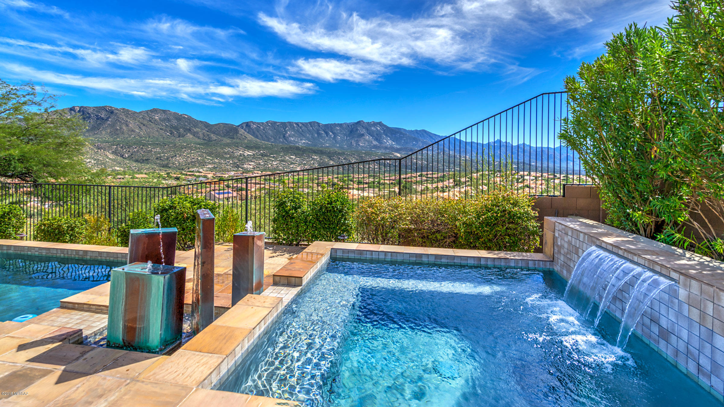 Spectacular unobstructed mountain views unfold before you when you walk into this beautiful Tierra home in the Preserve. Featuring 3 bedrooms 2.5 baths + guest casita & 3 car garage this home has a spacious great room w/wall of windows overlooking the view, kiva fireplace & custom entertainment wall. Kitchen w/gas cooktop, stainless appliances, granite counters opens to nook, great room & view. Butler's pantry has easy access to formal dining room. Master suite w/den, patio access & en-suite w/walk-thru shower + 2 walk-in closets. On the other side of home are 2 guest bedrooms w/Jack & Jill bath. Covered, flagstone patio, large fireplace, pool w/spa & custom water feature is ideal for entertaining or watching the mountains turn pink. Come see one of the best mountain views in SaddleBrooke.