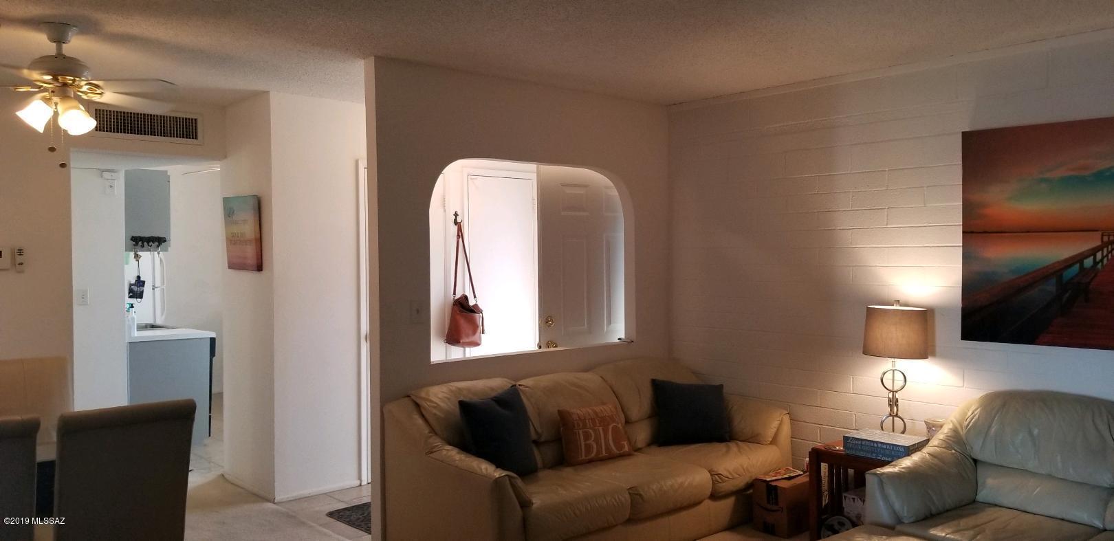 Move in ready 2 bedroom/1 bath coop in Central Tucson! Extra room for office or guest space. All appliances stay. Air conditioning to make your stay comfortable. Close to shopping, restaurants, big public park (golfing, dog park, park/rec, walking path). Monthly fee covers: Taxes, water, sewer, trash, roof, exterior, common area, pool, pest control.  Cash only, no rentals.