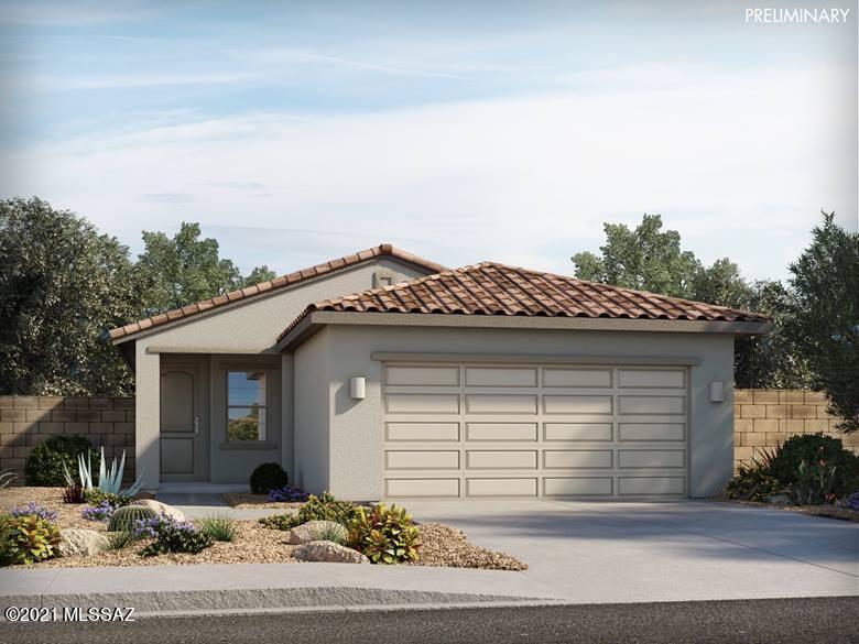 Brand NEW energy-efficient home ready May 2022! This single-story home has three bedrooms with lots of storage. Use the den as your work from home private space. Keep an eye on the party from the kitchen in the open concept floor plan. Las Patrias offers convenient access to employment centers and downtown Tucson. This family-friendly community features several amenities such as bike trails, playgrounds, and walking trails. Known for their energy-efficient features, our homes help you live a healthier and quieter lifestyle while saving you thousands on your utility bills.