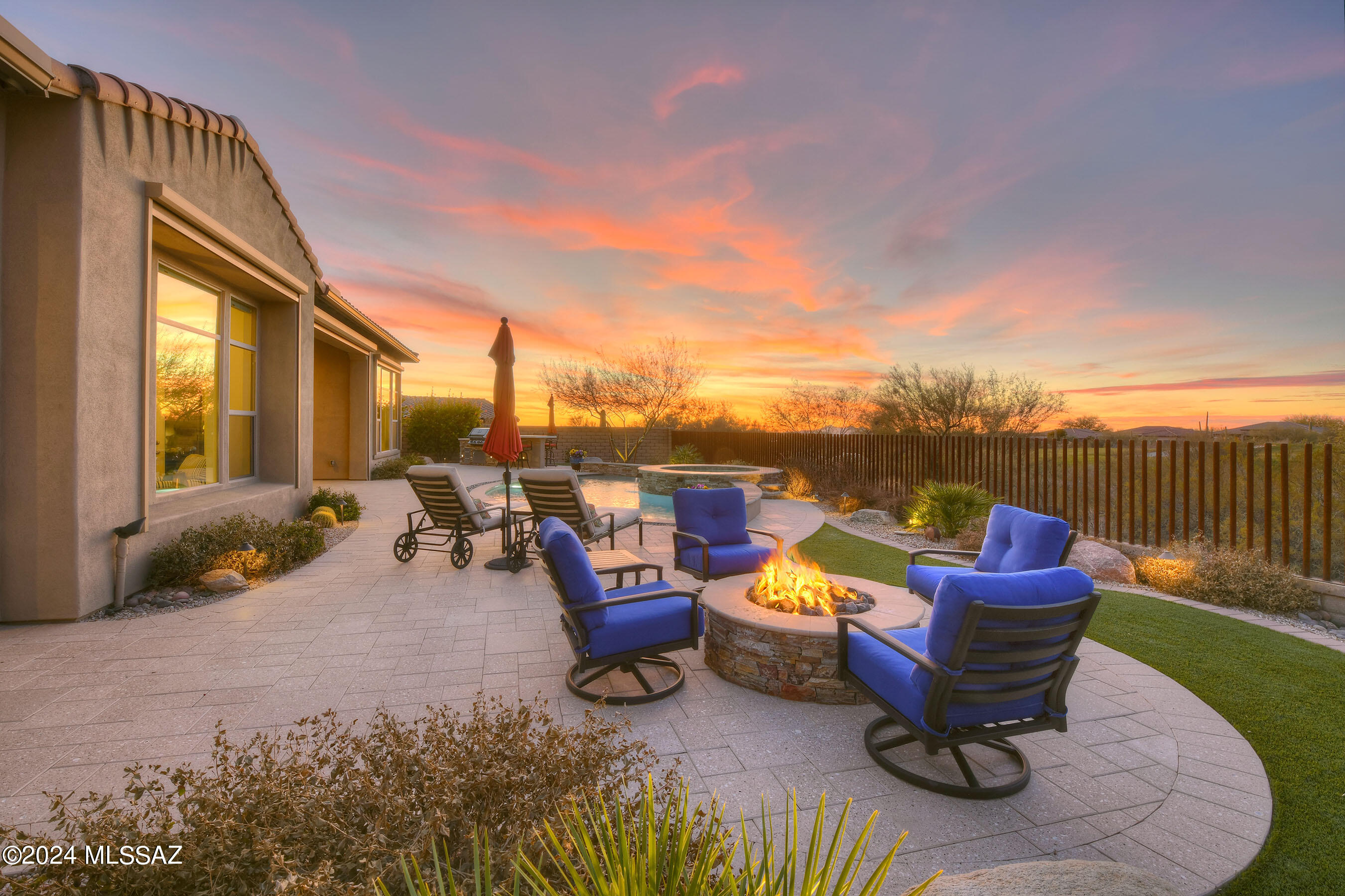*DESERT TREASURE* ONE OF THE ''BEST'' LOTS IN LOS SAGUAROS! TOLL BROS ESTATE OVERLOOKS THE ''GALLERY'' GOLF COURSE & SURROUNED BY   NATURAL DESERT/MAJESTIC MTN VISTAS & BRILLIANT SUNSETS! 
RESORT BKYD- BEAUTIFULLY DESIGNED- CIRCULAR HEATED POOL/SPA, WTR SPILLS, CHAT AREA- FIREPIT, ALFRESCO KIT/BBQ, PAVED PATIOS- PERFECT FOR ENTERTAINING!
PRIV CTYD FEELS LIKE A ''MAGIC GARDEN'' FILLED W/FLOWERS, SOOTHING WTR FEATURE- CREATE A TRANQUIL/ ZEN SETTING! GATHERING RM-STONE FP/MEDIA & WALL OF DISAPPEARING DOORS MAXIMIZING A SMOOTH TRANSITION TO OUTDOOR LIVING! GOURMET KIT OFFERS BUTLERS WALK IN PANTRY, PROFF SS APPLIC, GRANITE, CASUAL DINING/BKFAST BAR! *TURN KEY* POSSIBILITY - FURNISHINGS FOR SALE! ALL EN-SUITES, PRIMARY/SPA BA-SOAKING TUB, CALIF CLOSETS, 3 CAR TANDUM,AUTO SUN SHADES & MORE!