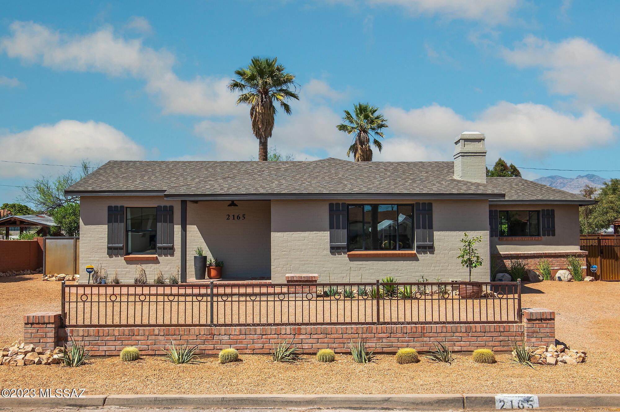 After a meticulous restoration, this bungalow in the Historic Catalina Vista neighborhood is replete with custom craftsmanship. Updated and expanded for modern living, the house has all new plumbing, electrical, windows, roofing, and fixtures throughout. The captivating main home and guest house are fitted with locally made alder cabinetry, beveled quartz countertops, and elegant tile work. Solid hardwood floors, built in niches, and beamed ceilings create warm spaces rich in character. The gracious primary suite has an alcove for reading, ample bathroom with double sinks, private toilet, linen closet, and door to the patio. A split floor plan leads to two additional bedrooms and delightful laundry room with sink and generous storage. 
(Owner/Agent) Natural light teems from abundant windows which overlook the manicured landscape and sparkling pool. Beyond the expansive brick patio lies the studio guest house with a kitchen and bathroom which has a convenient door to the pool & patio. An additional bonus room is perfect for an artist's studio, gym, or work from home. Just minutes from the Arizona Inn, Banner UMC Hospital, and the University of Arizona.
(Owner/Agent)