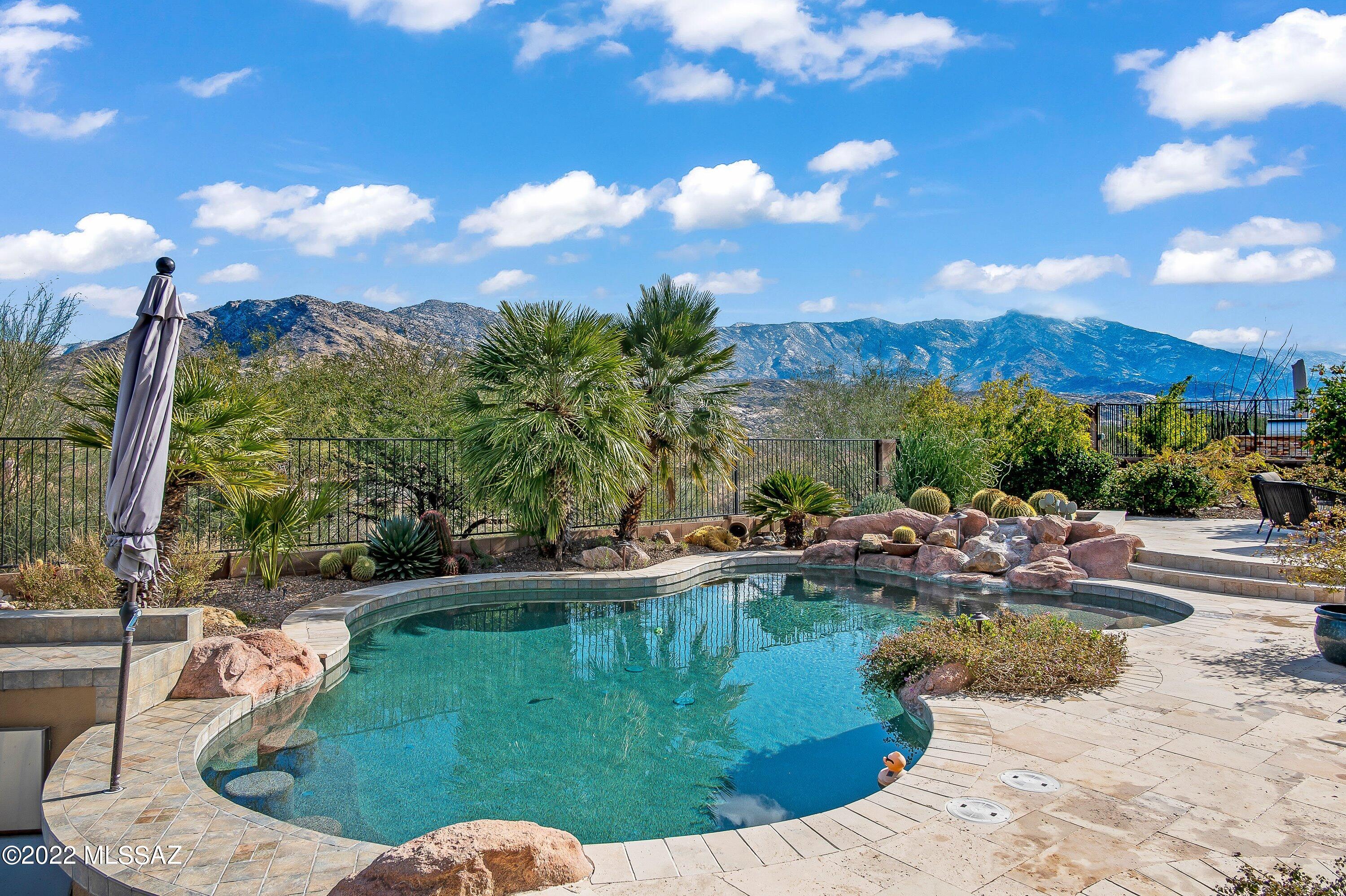 Enjoy stunning mountain views from this updated Sabino model w private guest Casita & sparkling pool in SaddleBrooke's Preserve. The spacious great room overlooks the custom pool w Catalina Mountains beyond. Updated kitchen w light quartz counters & gray cabinets has stainless appliances including gas cooktop, walk-in pantry & is open to morning room. Owner's retreat has views, en-suite w double vanities, soaking tub, large tile walk-in shower & walk-in closet. Guest suite, powder room, convenient den + 3 car garage.  Spacious courtyard is an ideal private spot for your Casita guests to enjoy. Backyard designed for entertaining awaits w sunken kitchen, freeform pool, gas fire pit, & expanded hardscape taking full advantage of incredible mountain views. Come enjoy the best of SaddleBrooke
