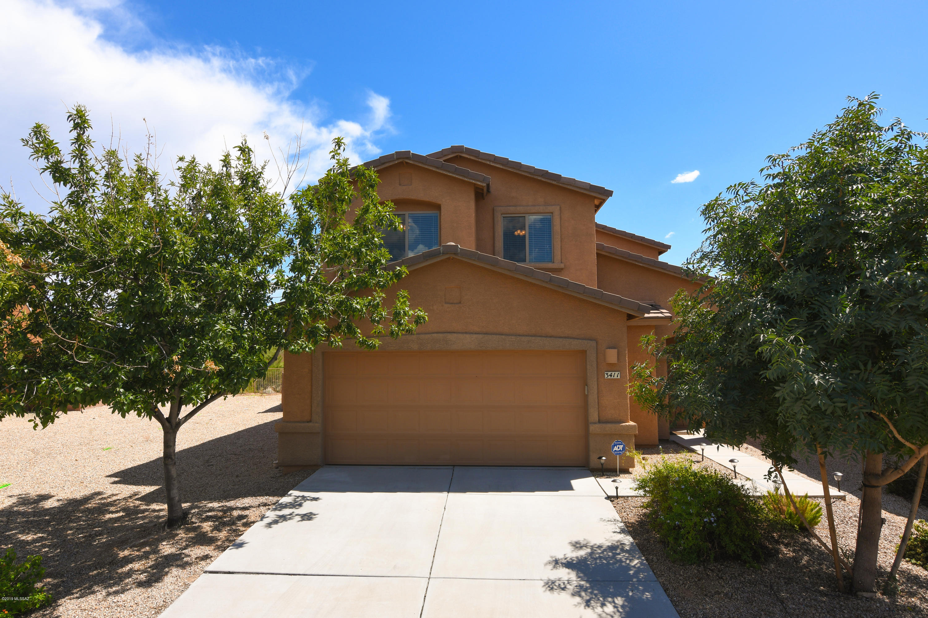 Immaculate Northwest Tucson Home with an Open Great Room Design in a Private Setting Backing to Open Space. Kitchen with Solid Surface Counters, Center Island with Breakfast Bar & Walk-in Pantry. Dining Area Accommodates a Large Table for Entertaining. Open Great Room with Gorgeous Flooring. Spacious Master Suite with Vaulted Ceilings. Generous Master Bath with Double Sink Vanity & Large Walk-in Closet. Laundry & Powder Rooms. Fabulous Outdoor Living Space with a Shady Covered Porch, Extended Flagstone Patio, Turf Area, Ventilated Playhouse, Custom Swing Set, Fenced-in Pet Friendly Yard & Catalina Mountain Views. Clean 2-Car Garage. Ultra Convenient Northwest Tucson Location Close to Shopping, Entertainment & I-10 Access. New Water Heater& HVAC Condensing Unit. Meticulous Move-in Condition