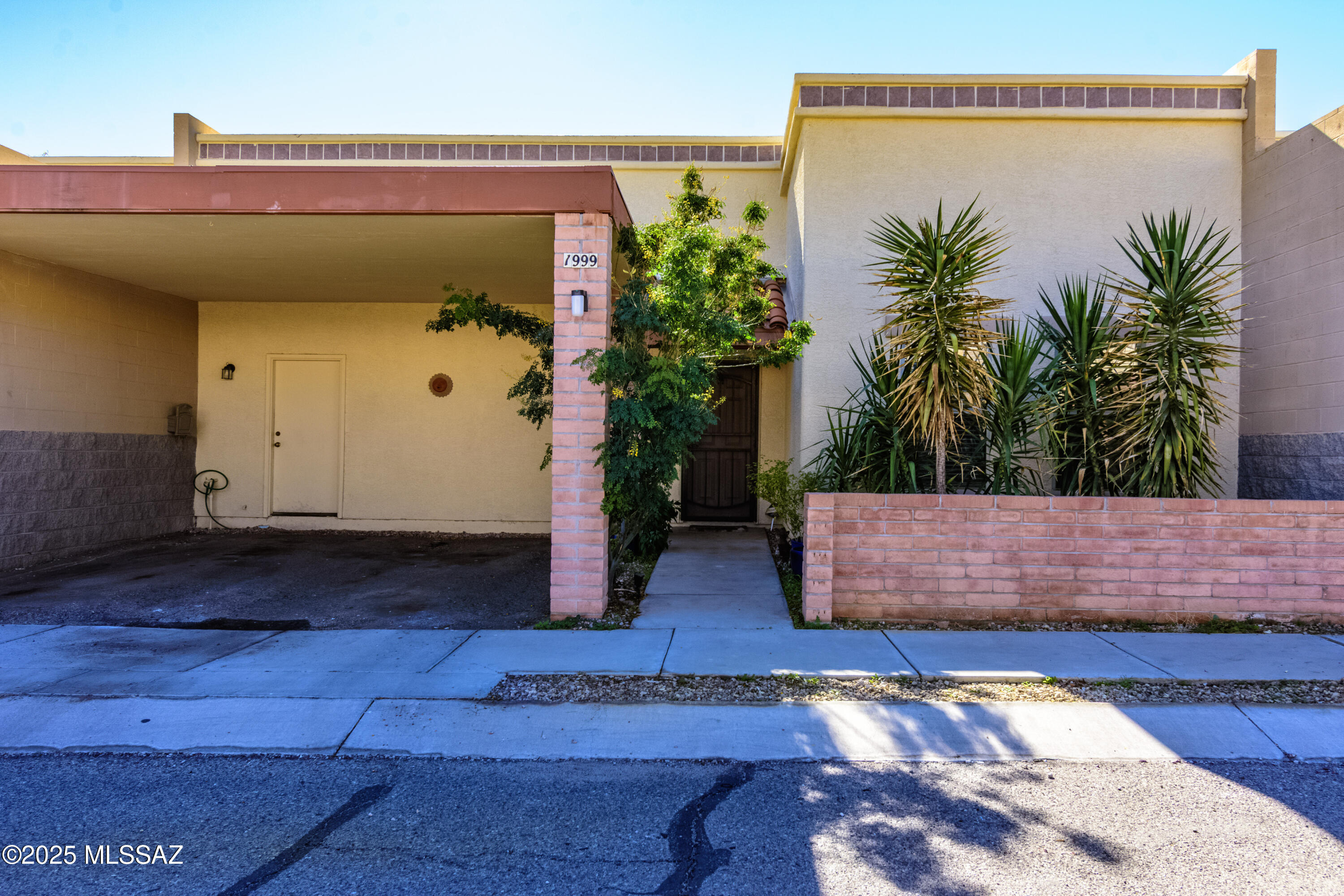Discover this charming Westside townhome offering a well-designed 3-bedroom, 2-bath split floor plan that provides both comfort and privacy. All bedrooms feature walk-in closets, while durable tile flooring runs throughout the home (no carpet), creating a clean, low-maintenance living environment. A new roof completed in October 2024 adds peace of mind and long-term value. Rentals are allowed, making this property an excellent opportunity for both owner-occupants and investors. HOA covers road maintenance, common area landscaping, access to a community park, and trash pickup, enhancing convenience and overall appeal. Ideally located close to downtown Tucson, scenic hiking trails, and Starr Pass, this townhome offers an exceptional combination of lifestyle, location, and versatility.
