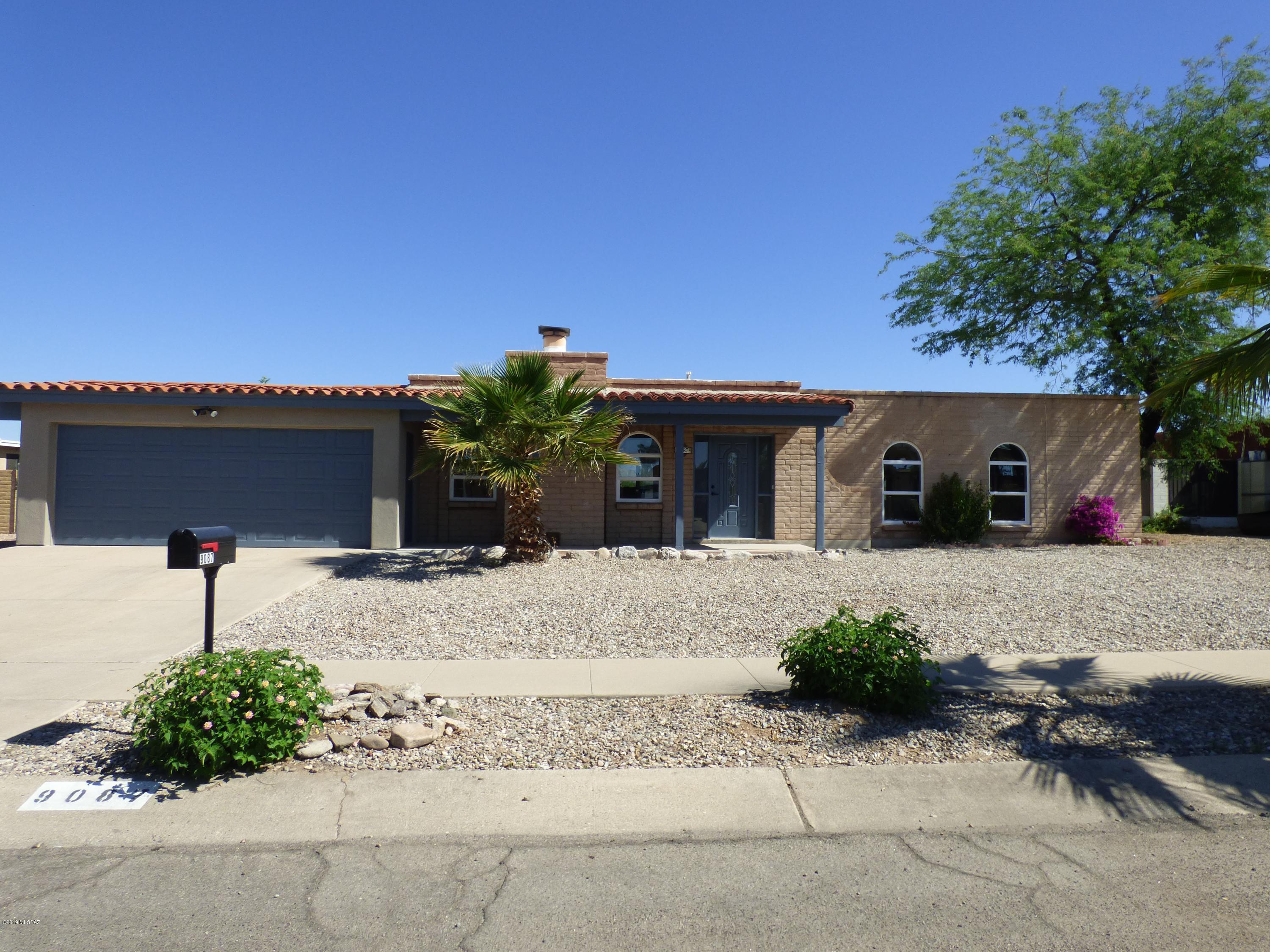 Modernized stunningly beautiful east side home. Tastefully chosen color palette & numerous upgrades. New  kitchen cabinetry, SS dishwasher, range, disposal,  & dbl sink. granite kitchen counter tops, &  butcher block breakfast bar counter top.  Recessed lighting in kitchen & hallway. New lighting, plumbing fixtures and hardware, New Low E  dbl pane windows pane  throughout. Roof re-coated. All walls sheet rocked & additional insulation added. Modern ceramic l tile flooring throughout & new carpeting in bedrooms. Ceiling fans. Spacious backyard with grape vines  and mountain views. BONUS ROOM PERFECT FOR MAN CAVE NOT INCl. IN SQFT.  Many more features MUST SEE!