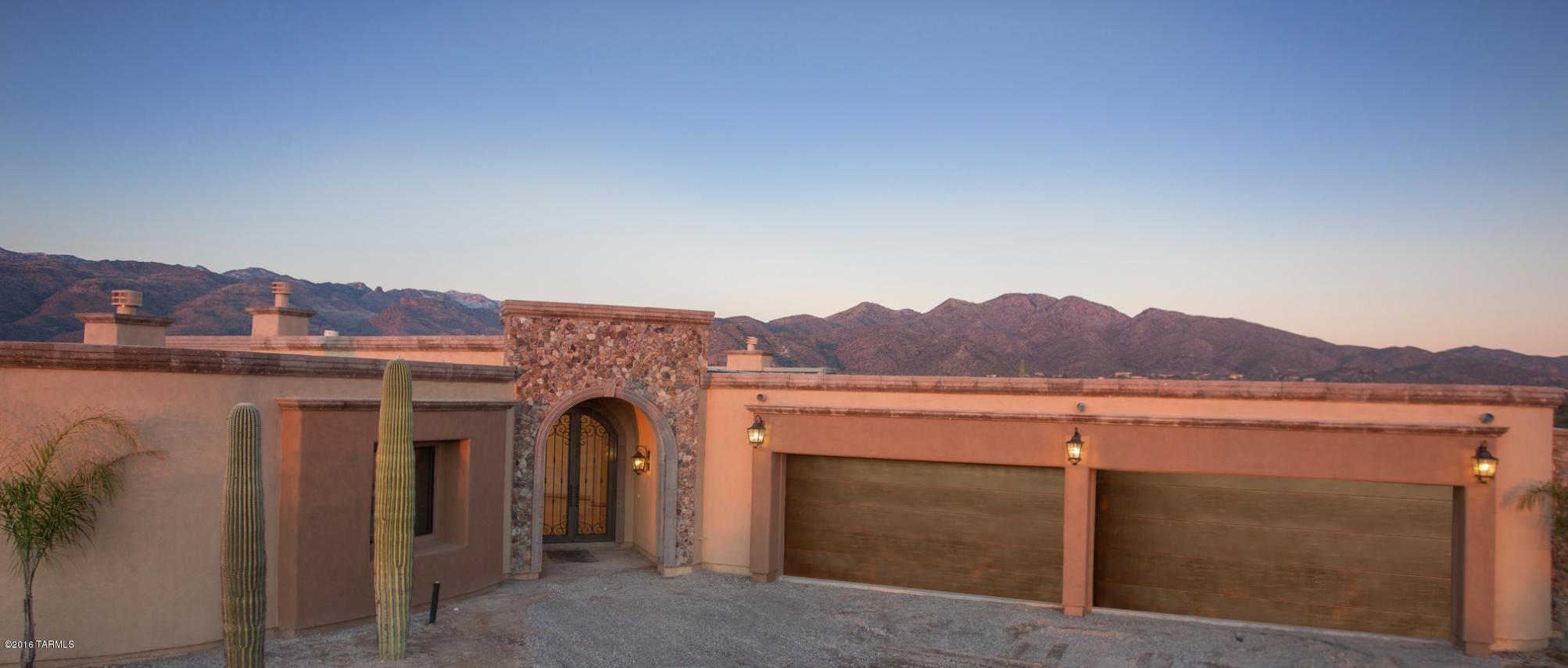 Incredible 2016 new construction in private gated Rancho Soldados is now available for the discerning Buyer. This 5,367 square foot transitional style home offers the owner a lavish and tranquil private retreat. Exceptionally built, this property has all of the tasteful, high quality design elements and modern amenities you would expect consisting of 5 bedrooms/5 baths, media room, state-of-the-art appliances w/granite slab counters, Travertine floors and brick paver driveway leading to 4 car garage. Enjoy the abundant space in back yard to entertain family & friends w/pool/spa and spectacular views of The Catalinas. Seller/Builder is licensed Realtor in Arizona.