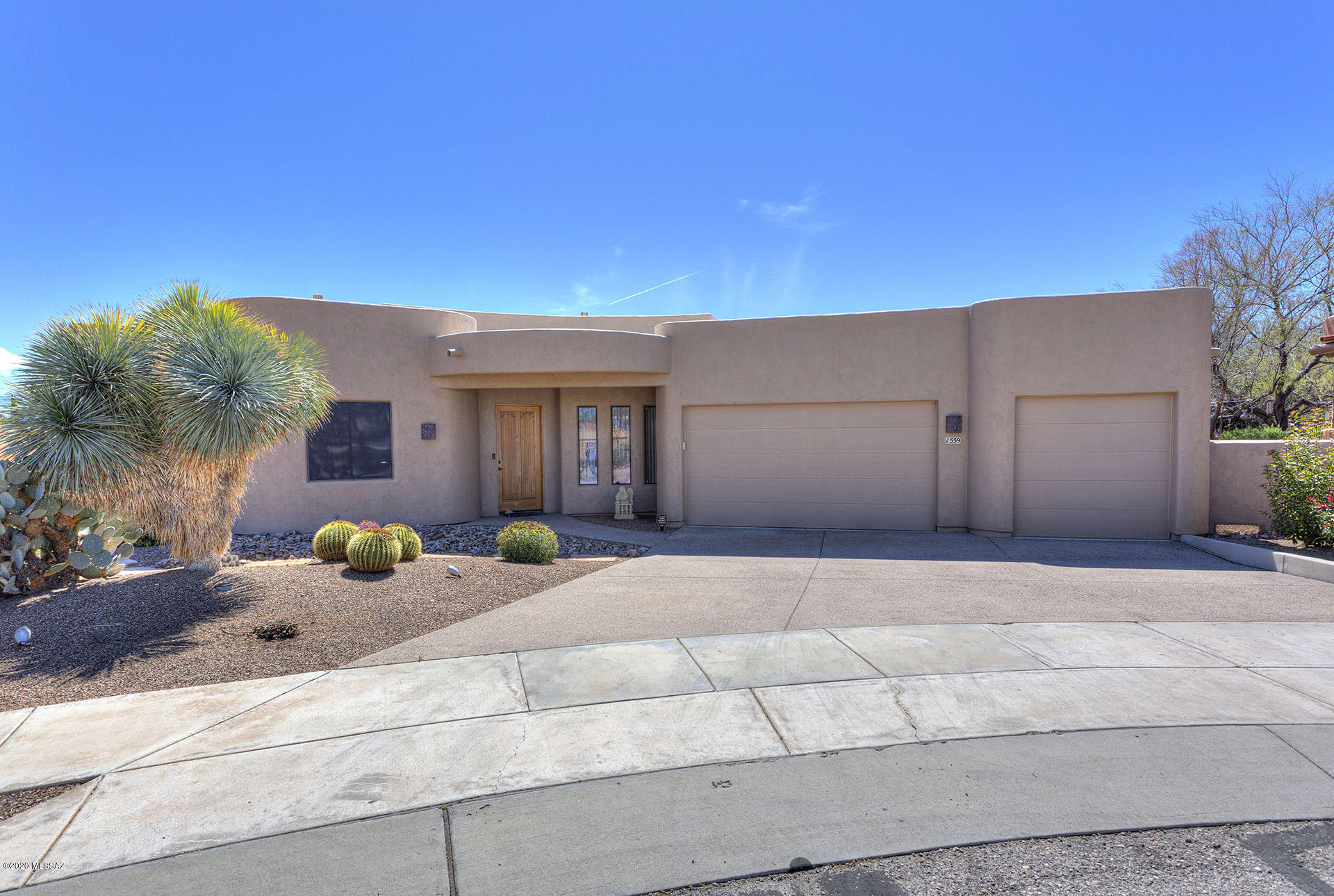 Gorgeous semi-custom home in the highly desirable subdivision of La Canada Norte II. Homes of this caliber don't come on the market very often, so don't miss this one! Situated in a cul-de-sac,,upgrades including 24 inch Travertine tile, solid alder wood doors & cabinets, granite counters throughout & soaring ceilings. Gourmet kitchen is a chef's dream come true w/built in wall oven & microwave, cooktop, pantry, tons of cabinets, beautiful granite countertops and a custom alder buffet. Spacious family room w/ fireplace; formal dining room. Fabulous master suite with tiled walk-in shower & tub.  Professionally landscaped backyard features a wrap-around patio w/wall mounted tv, rock fountain & gazebo... perfect for entertaining or relaxing. HOA dues are only $161 a year.  3 CAR GARAGE with 8 storage cabinets! Split bedroom plan. Walk-in closets, spacious bedroom. 4th bedroom is being used as a den & includes custom built alder cabinetry. All new LED lighting inside and out. Recently painted exterior. Water softener, gas grill, all window coverings and ceiling fans convey. So nice! You will love to make this your home.