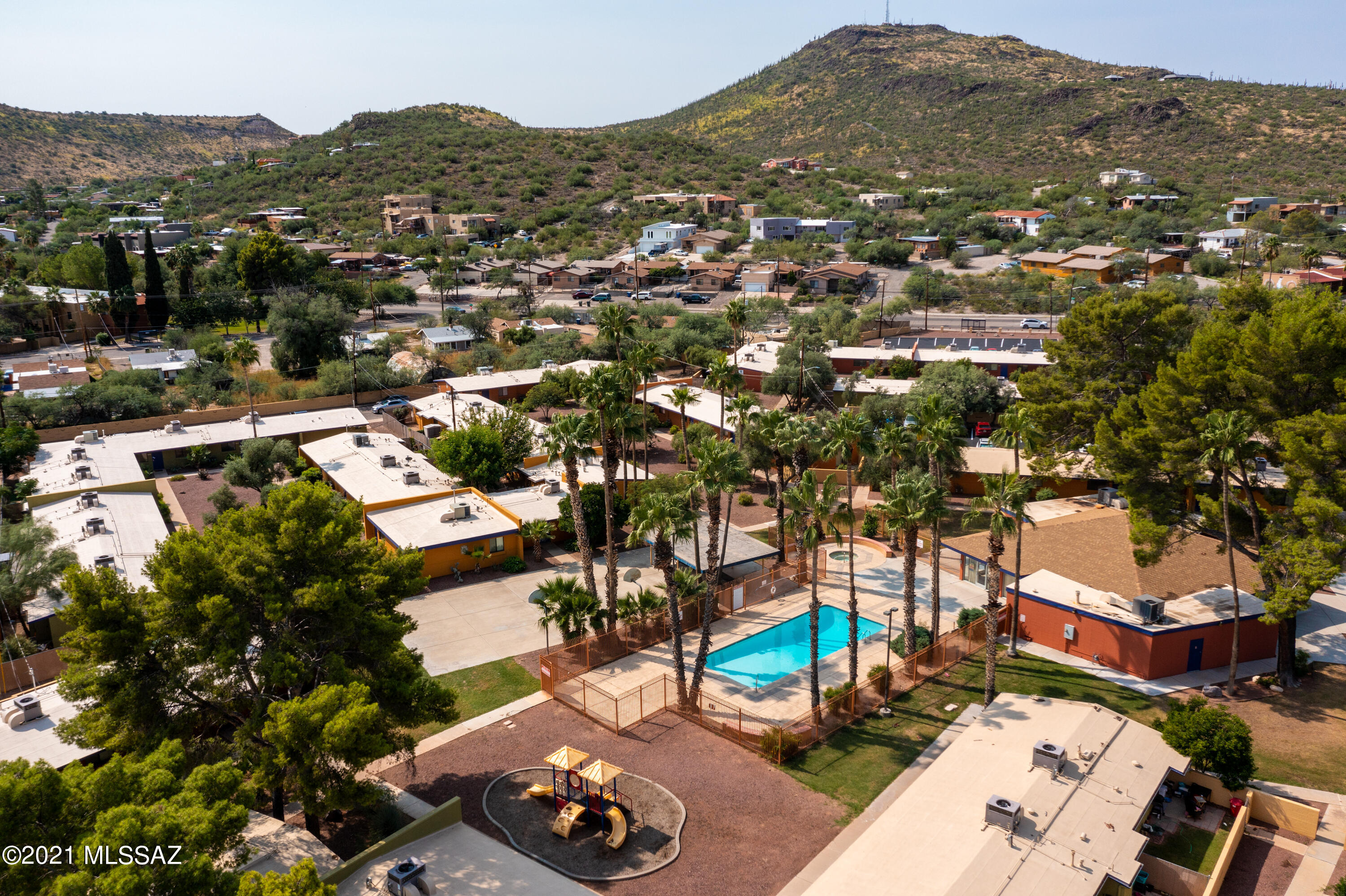 This single-level, 1-bed 1-bath condominium is located in a well-maintained gated community with mature trees and landscaping near downtown Tucson. It is across the street from Saint Mary's Hospital, a few blocks from Safeway, near Pima College, has easy freeway access, and is walking distance to Tumamoc Hill and A Mountain. The community offers a Pool/Spa, basketball courts, playground, and a clubhouse. This unit will transform into a wonderful starter home, student housing, a cozy winter getaway, or an income-producing property for the budding investor.