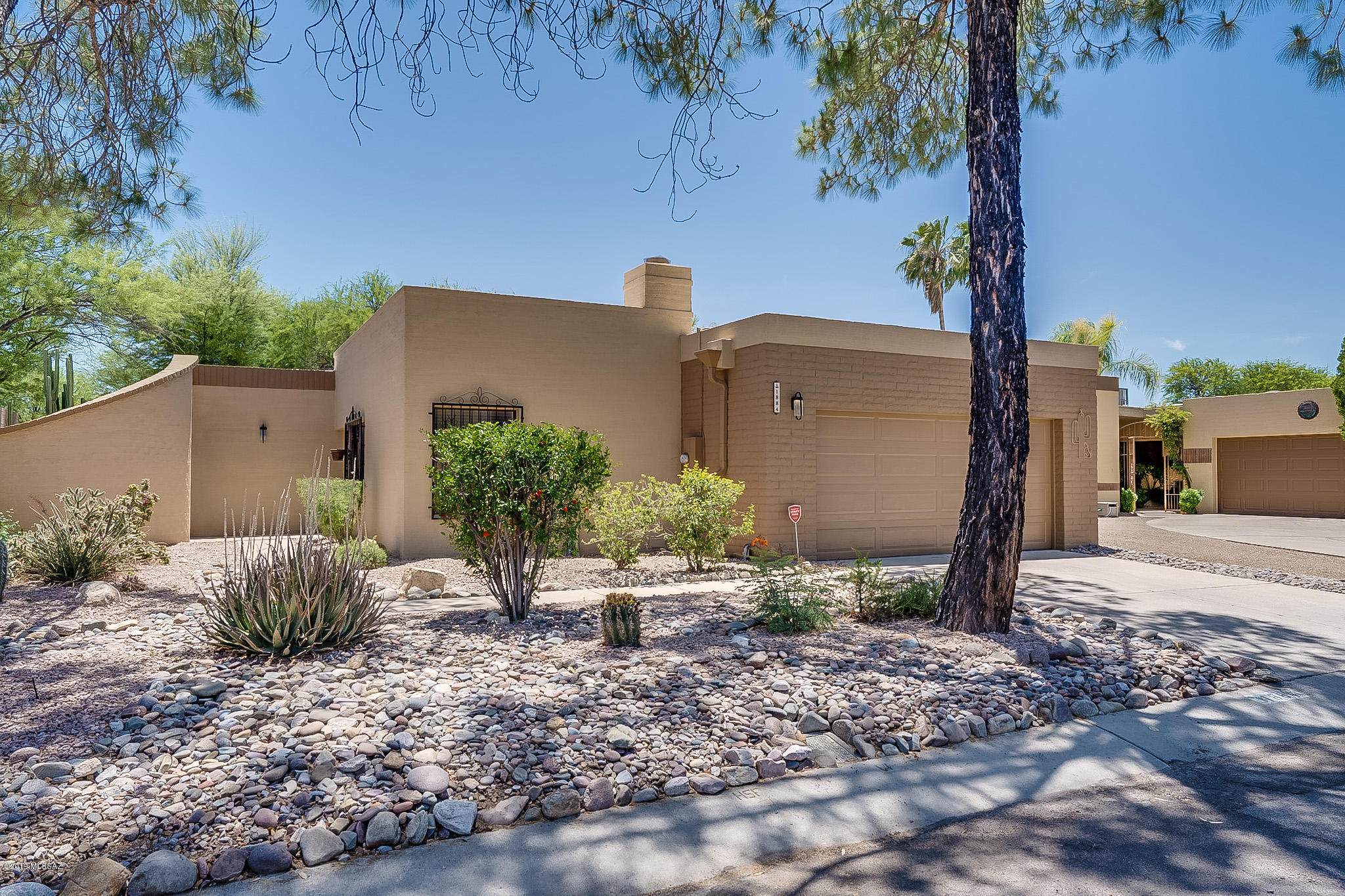 Welcome home to this amazing beautiful property in the quiet, clean, quaint Fountain Park neighborhood. Enjoy the very large private, serene backyard, perfect for entertaining. 1-year new kitchen island hood vent; 2-year new water heater; large over-sized garage with epoxy painted floor, accommodates large truck. Interior, exterior paint, new carpet 2017. Beautiful slate countertops throughout. Large master suite with egress to yard. Interior atrium. Community offers walking/biking paths, fantastic playground for kids and much more. Great location, close to town/amenities. Select furniture and household items available for purchase on separate bill of sale. Homes selling fast in this neighborhood. So hurry on out. This won't last long! Seller licensed to practice real estate in Arizona.