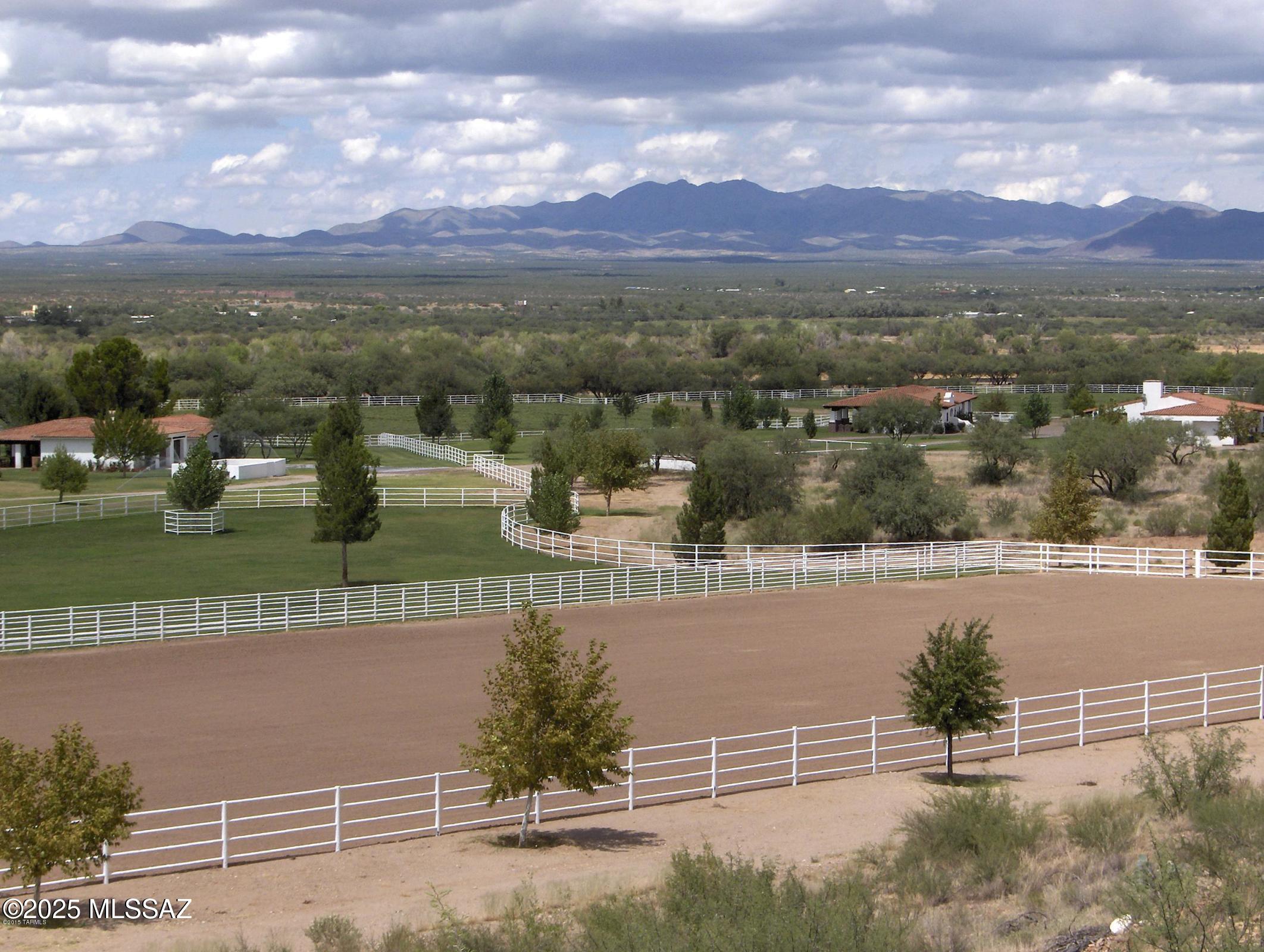 A CLASSIC ARIZONA LEGACY RANCH! The 3,787 acre Montosa Canyon Ranch is the premier Gentleman's Ranch. Located 30 minutes south of Tucson in Santa Cruz County spreading out across 627 deeded acres of lush irrigated pastures & rich native grasslands. There are 3,160 acres of State leased land adjacent to the deeded acreage creating a ranch that is second to none. It has excellent Grandfathered Irrigation Water Rights including 2 irrigation wells that produce 1,000 GPM each! There are 3 other wells on the deeded & 2 wells on the State lease. With the towering Santa Rita and Tumacacori Mountains as its backdrop, the main home, guest home & show barn have all been developed to the very highest standards of quality artisan craftsmanship as an exceptional Spanish Colonial equestrian estate!
