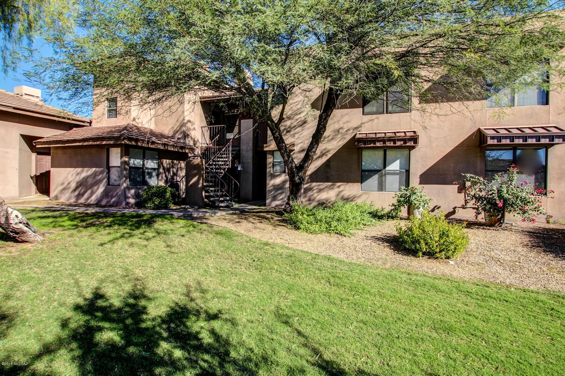 Private condo located in The Greens at Ventana Canyon.  Bordering the Ventana Golf and Racquet Club, plenty of hiking trails and upscale shopping. With over 800 square feet, 2 bedrooms and plenty of views this home features, beautiful dark wood like floors, plush carpeting, and a cozy fireplace in the great room. The kitchen includes updated counters, wood cabinetry, and all black appliances. Step out on your private balcony, ideal for enjoying a morning cup of coffee.