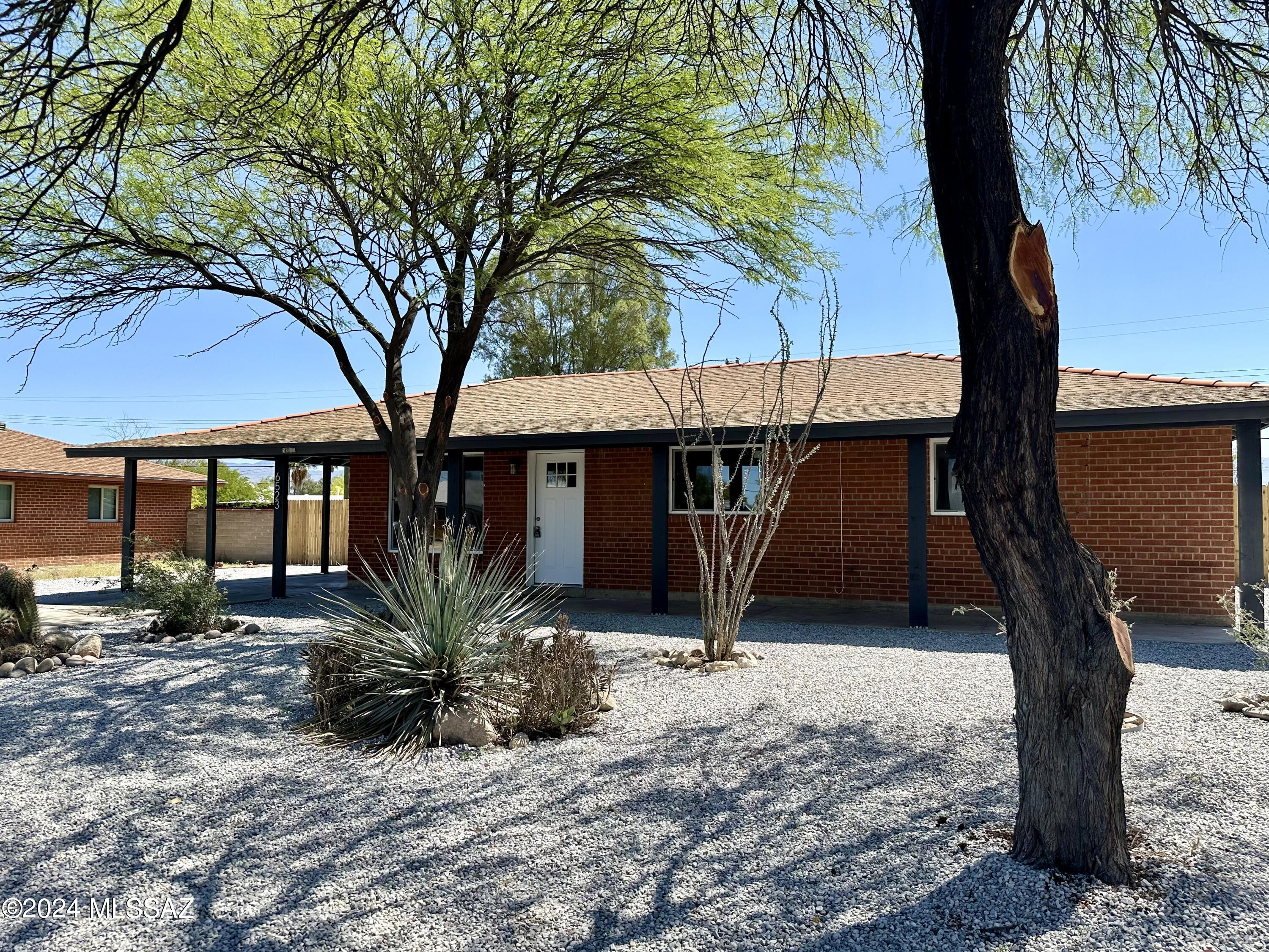 Charming recently remodeled brick ranch house. Freshly painted interior and exterior. All new kitchen cabinets and countertops with new appliances. Beautifully updated bathrooms and bedrooms with ceiling fans. Brand new flooring and carpet. New Dual Pane Windows, New A/C. Large covered patio and fenced in backyard.