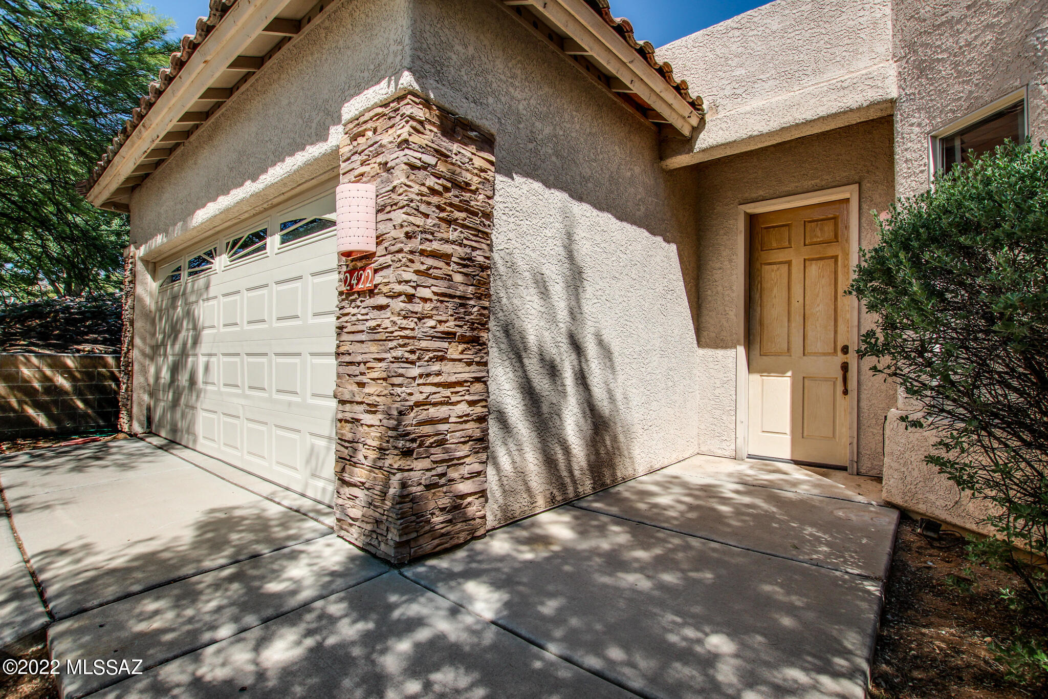 Welcome to this gated community in Northwest Tucson! Step into a great room with windows providing plenty of natural light. Immediately to your right you will find the kitchen which has plenty of storage and counter space. This 3 bedroom, 2 bathroom home provides plenty of livable space with 2,040 square feet. The only place you will find carpet in this home is in the master walk-in closet. Master bathroom provides you with double-vanity, a walk-in closet, tub and a walk-in shower. Step outside and see this high private lot that provides beautiful mountain views! Come take a look at this home today!