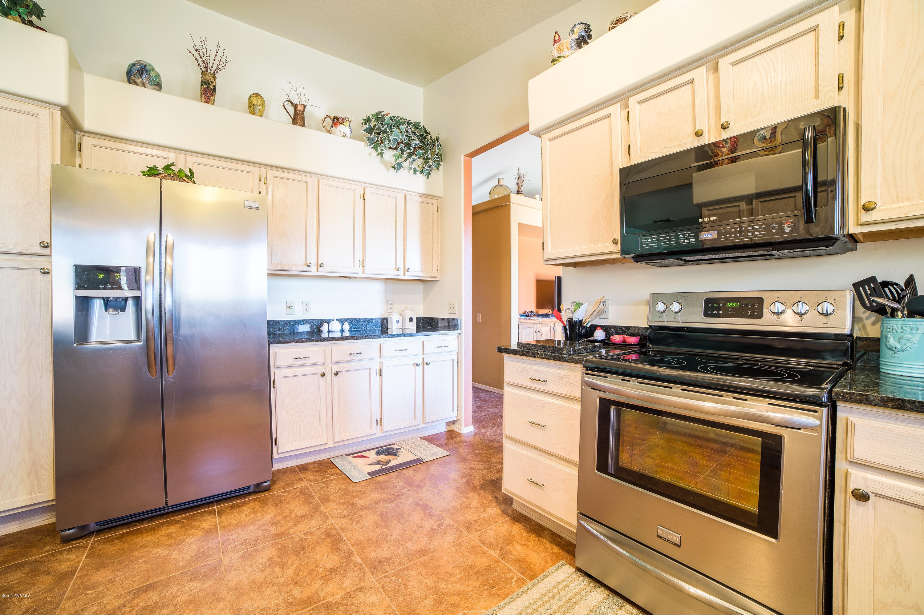 This sun-drenched, UPDATED 2 bed/2 bath single family home is perfectly situated on a HUGE and private corner lot! This home is offered FULLY FURNISHED w/ brand NEW furniture, TV's & decor, & includes dishes & Linens! New earth toned tile flows from the entry throughout the home. The front living area showcases stunning mountain views. The newly remodeled kitchen features rich granite counters, new stainless appliances, a new sink and designer paint. A breakfast bar and dining room are adjacent to the new kitchen making entertaing a breeze! The family room is cozy with custom hickory shelving and sliders leading out to the spacious back patio. With no one behind you, this outdoor living space is truly a desert oasis! A bonus room off of the kitchen is the perfect office/craft room  The master bedroom has dual sinks, a large walk-in closet, and private access to the back patio.|\n||\n|Supplement Remarks (10,000 characters max)Your winter visitors will love the gorgeous guest suit with windows framing Santa Rita Mountain views and a sliding door closing off the area for ultimate privacy. With a NEW htg/cooling unit, NEW water heater, New paint, NEW sun screens, NEW tile and NEW kitchen, this home is a rare find!